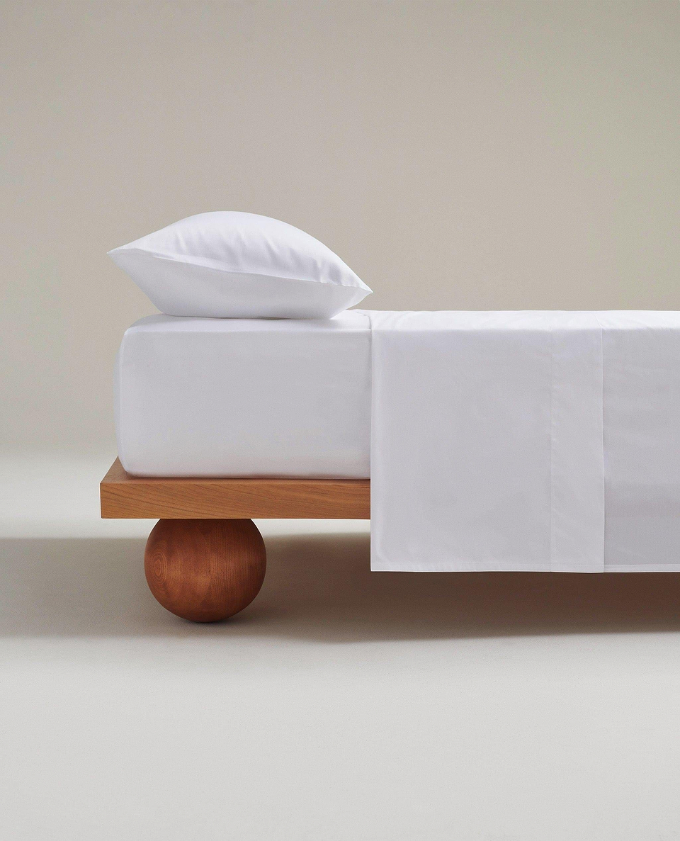 Image 3 of 6 showing Rise & Fall's white Soft & Smooth sateen cotton deep fitted sheet.