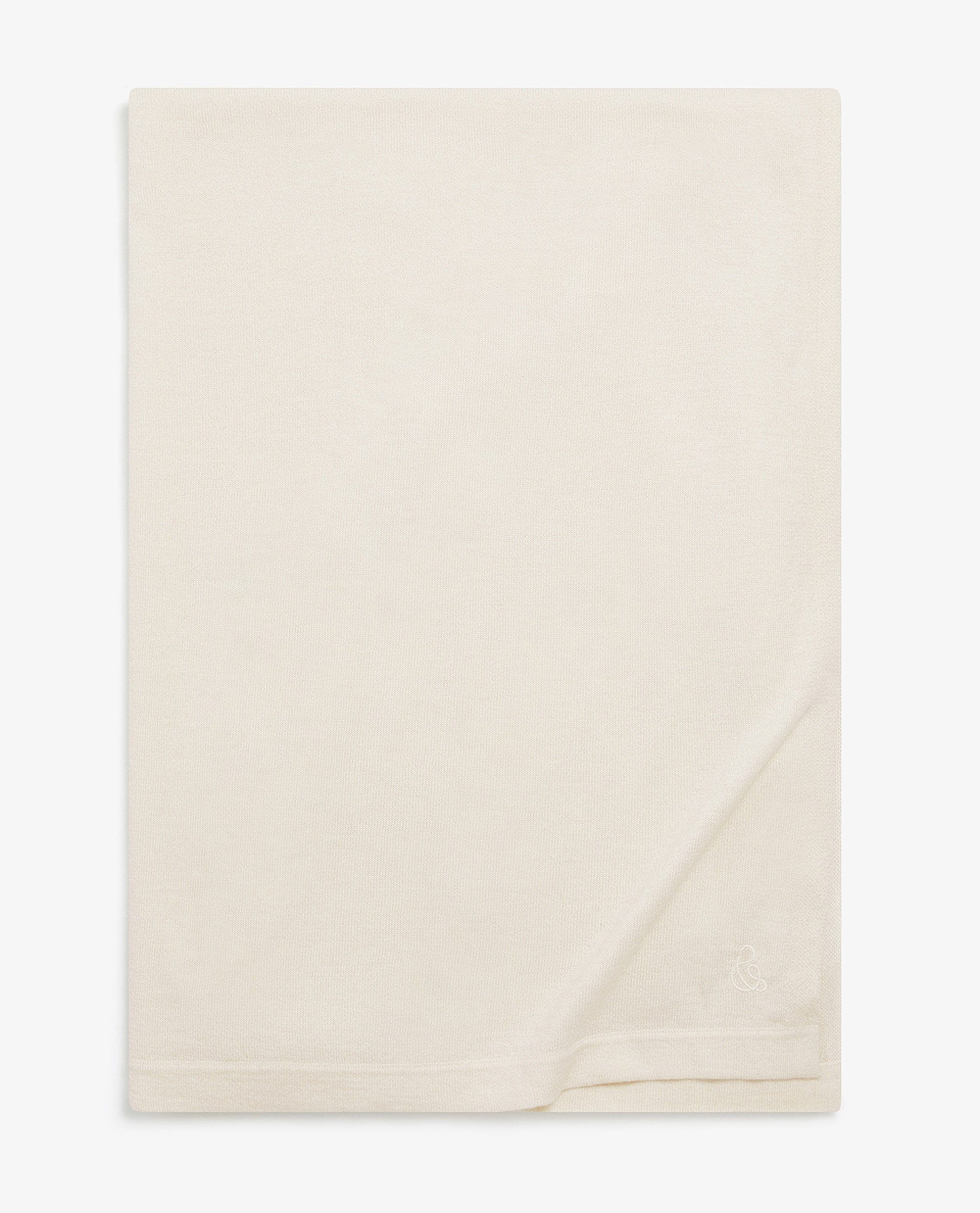 Image 4 of 4 showing Rise & Fall's oversized cashmere scarf in buttermilk.