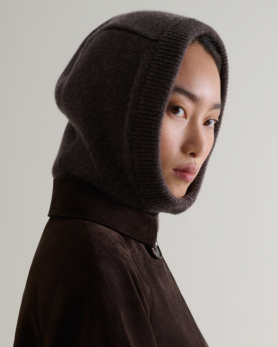 Image 4 of 4 showing woman wearing Rise & Fall's chocolate brown Cashmere Merino Knitted Hood.