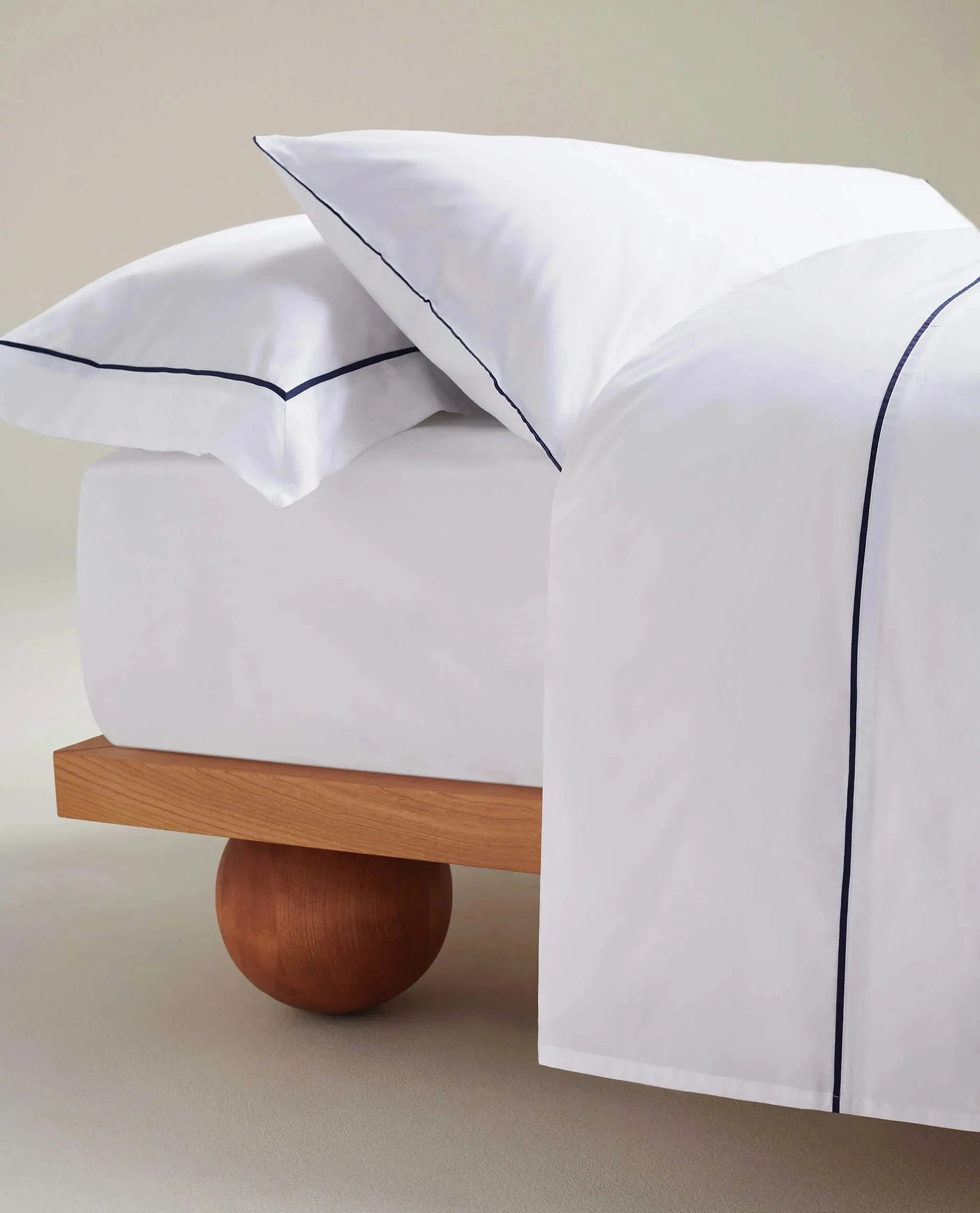 image 4 of 5 showing Rise & Fall's Crisp & Cool duvet set, colour: white navy piping, fabric: percale cotton