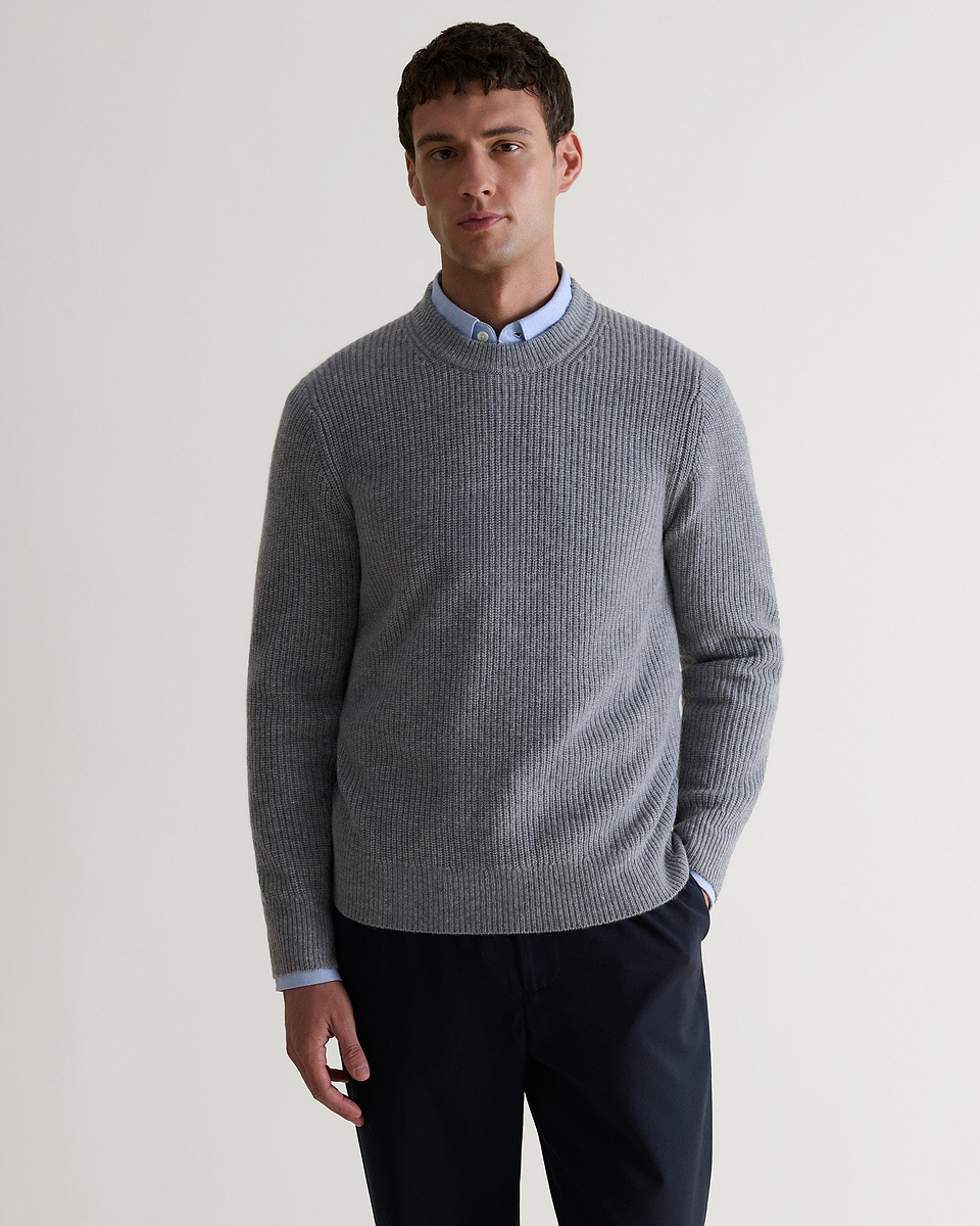 Image 4 of 5 showing man wearing Rise & Fall's Cashmere Merino Fishermans Rib Crew Neck Jumper in grey.
