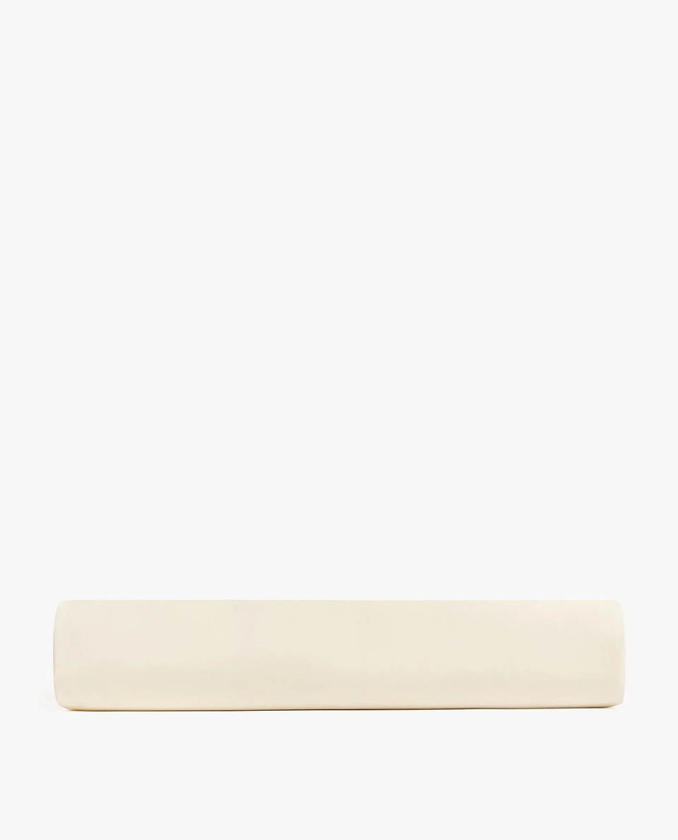 Image 4 of 5 showing Rise & Fall's buttermilk Soft & Smooth sateen cotton deep fitted sheet.