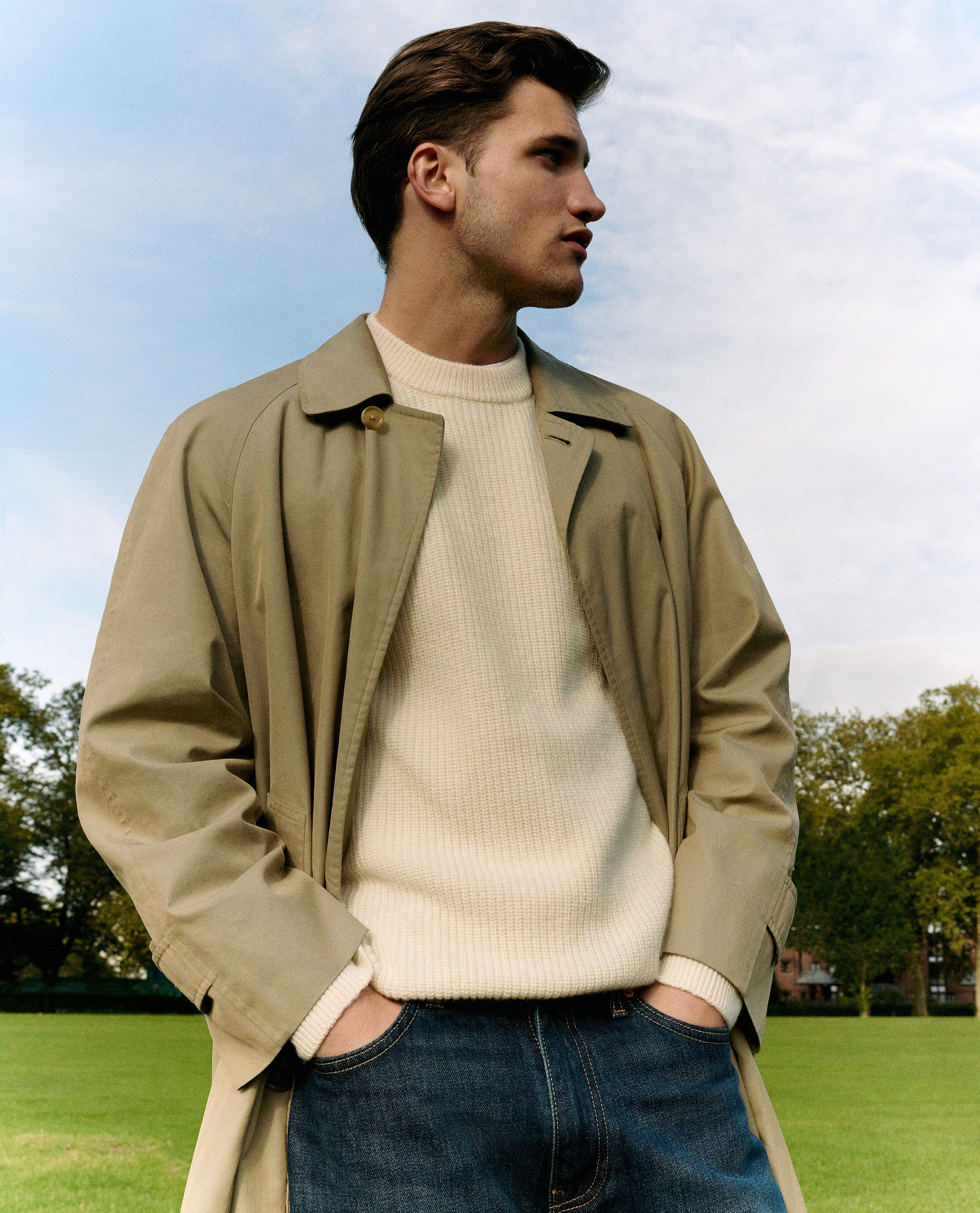 Image 5 of 5 showing man wearing Rise & Fall's Cashmere Merino Fishermans Rib Crew Neck Jumper in cream.