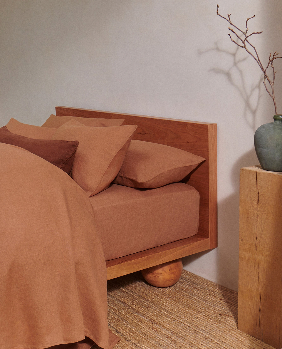 image 5 of 6 showing bed with Rise & Fall's Relaxed & Refined linen duvet set, fabric: European flax, colour: ochre