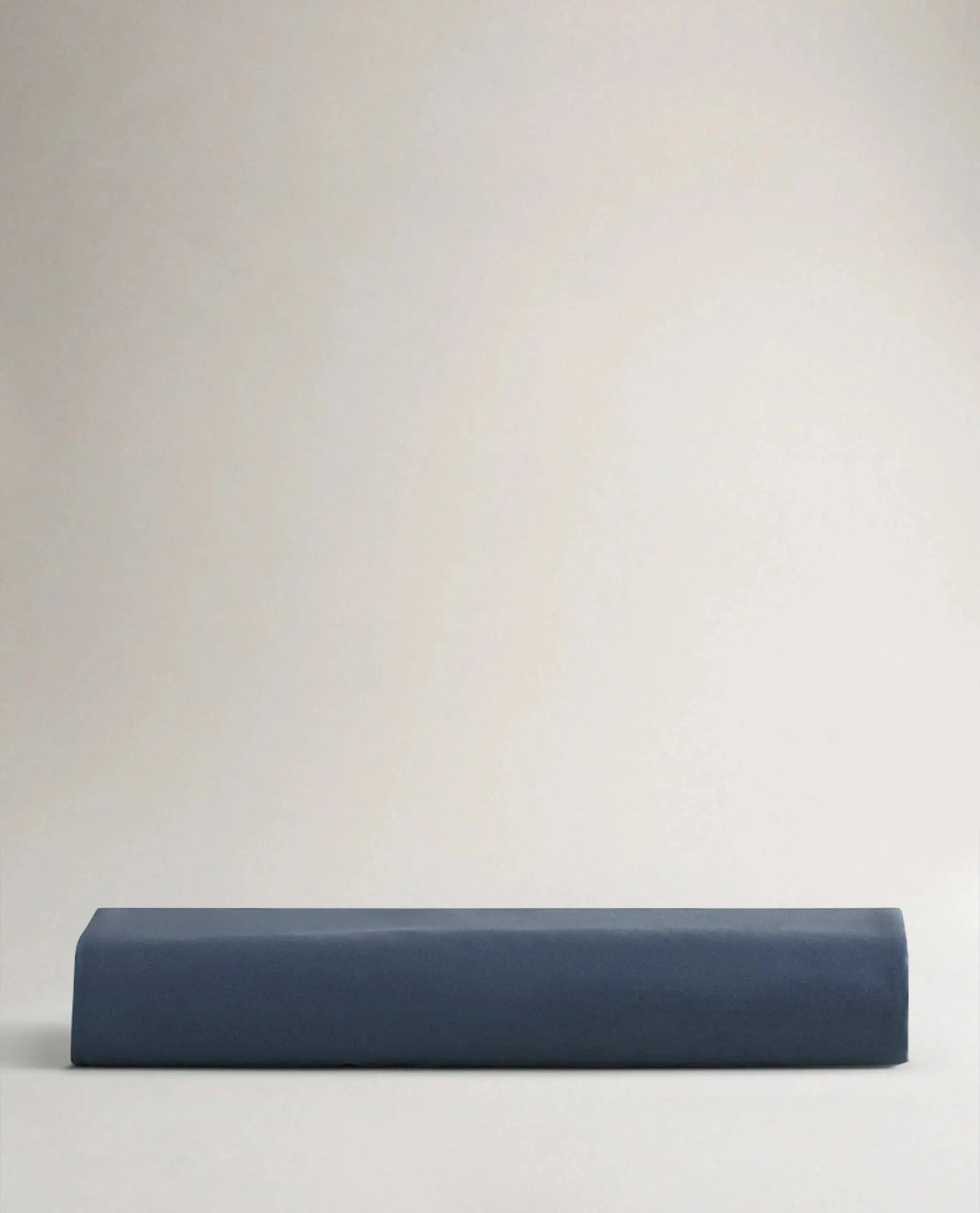 Image 5 of 6 showing Rise & Fall's Crisp & Cool organic cotton fitted sheet in indigo.