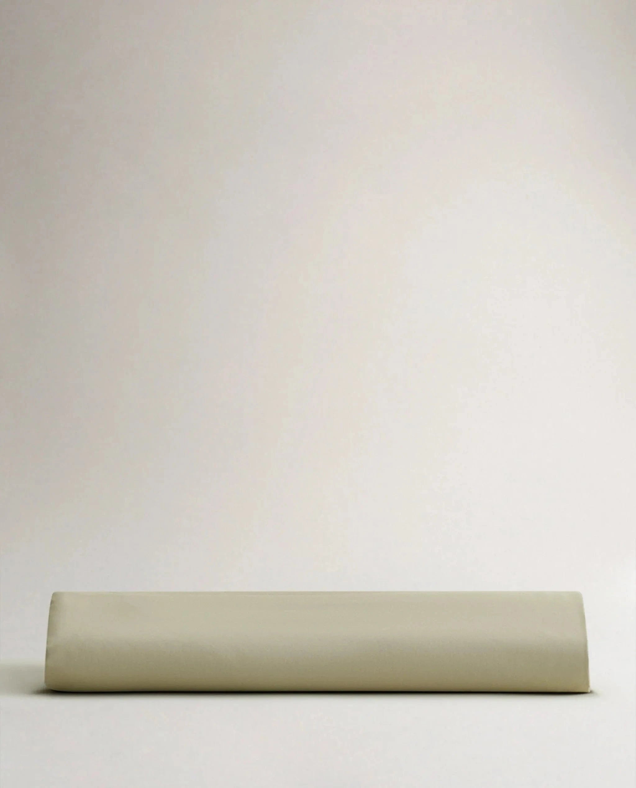 Image 5 of 6 showing Rise & Fall's Crisp & Cool organic cotton fitted bed sheet in sage.