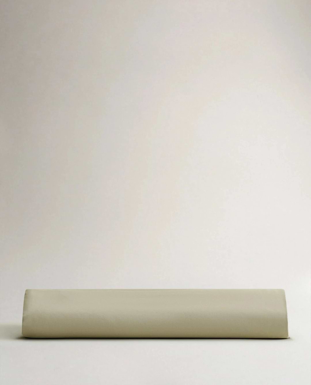 Image 5 of 6 showing Rise & Fall's Crisp & Cool organic cotton fitted bed sheet in sage.