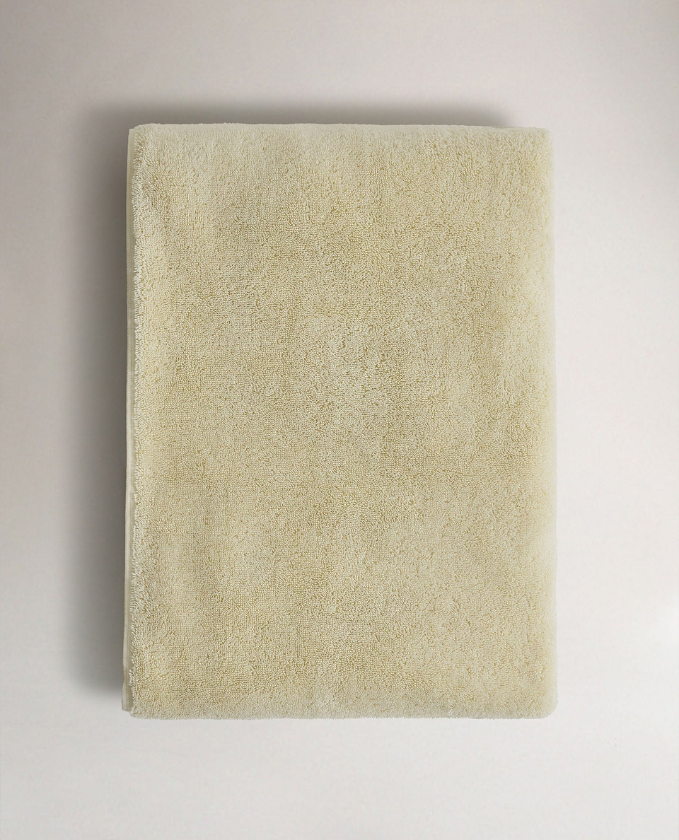 Top view of Rise & Fall's buttermilk ultra-absorbant Turkish cotton bath towel