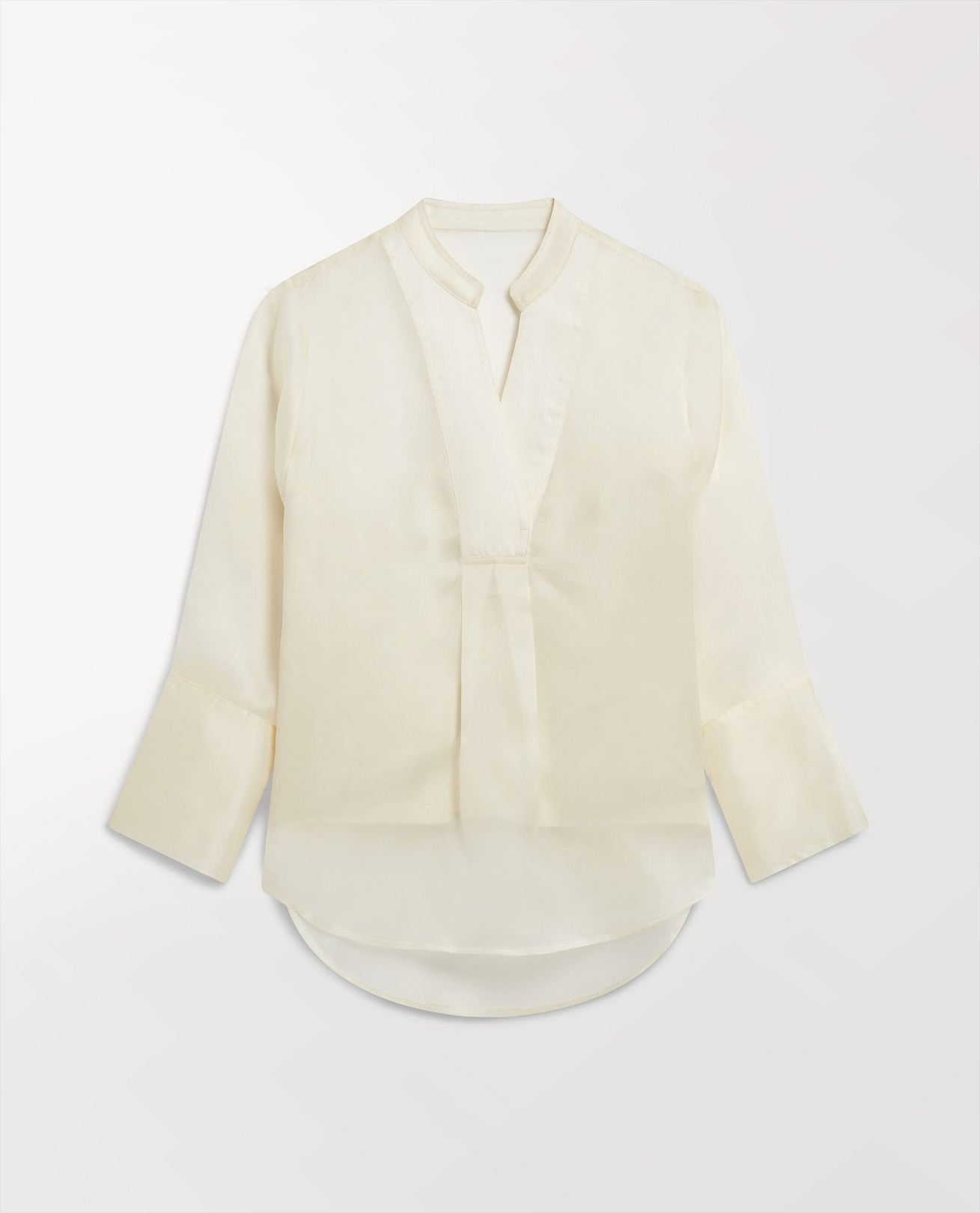 Woman's silk organza tunic blouse in shell.