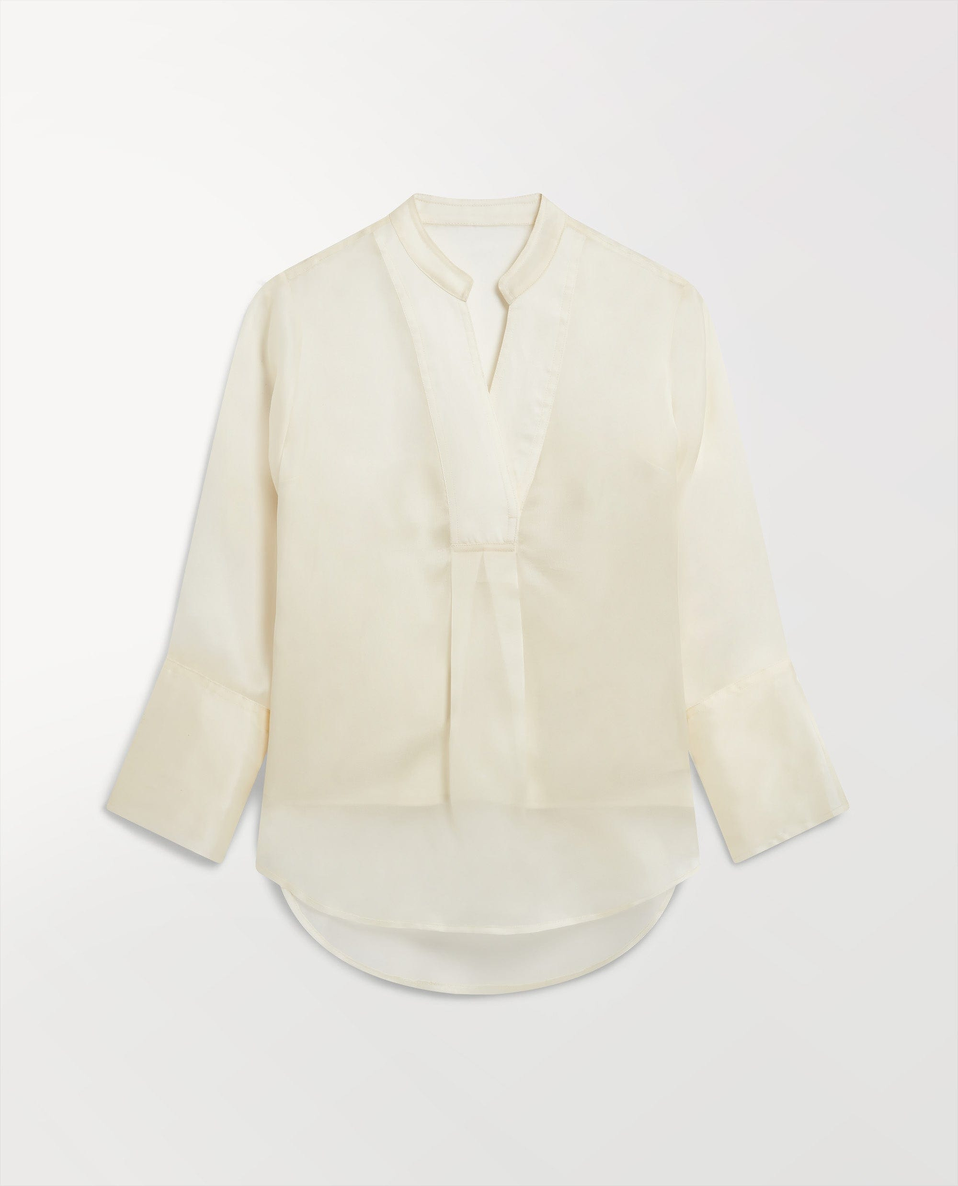 Woman's silk organza tunic blouse in shell.