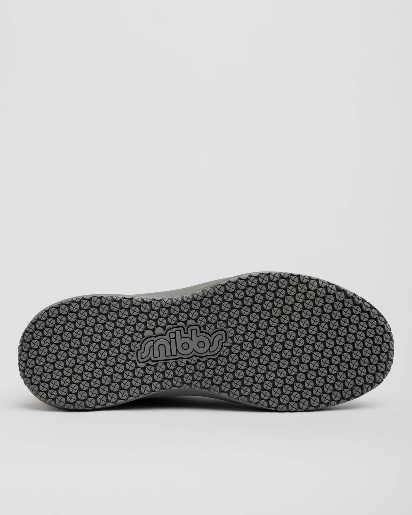 The ROVR Mid - Climbing Ivy by Snibbs features a slip-resistant sole with a hexagonal texture and "snibbs" printed in the center.
