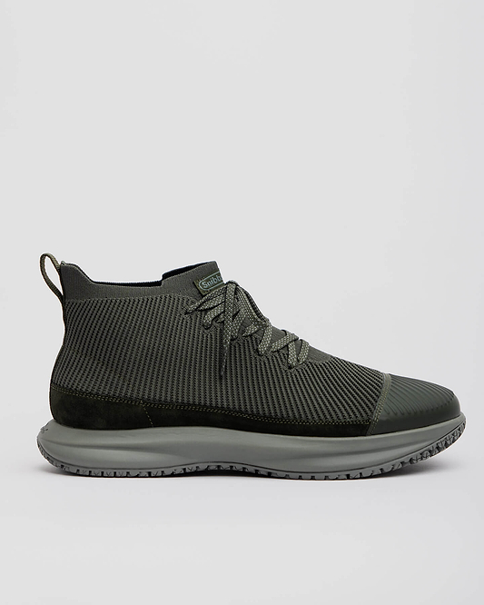 The Snibbs ROVR Mid - Climbing Ivy: dark green knit athletic shoe with laces, slip-resistant sole, and heel pull tab, side view.