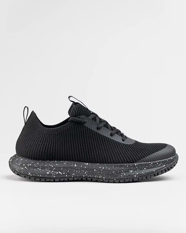 ROVR - Black Speckle by Snibbs: a black, ribbed athletic shoe with speckled sole, slip resistant, shown in profile on a plain background.