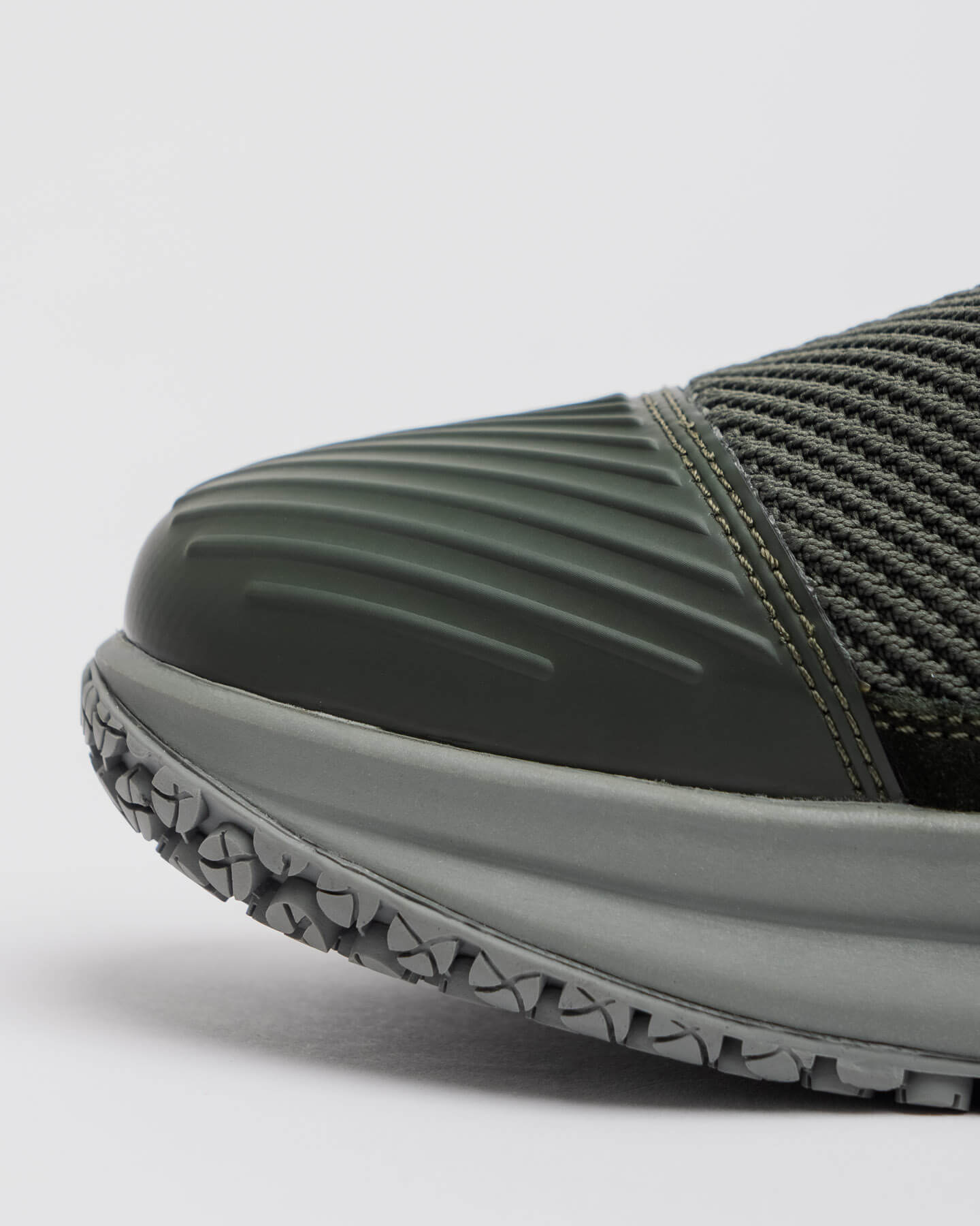 Close-up of the Snibbs ROVR Mid - Climbing Ivy, featuring water-resistant suede, textured mesh, and a patterned gray sole.