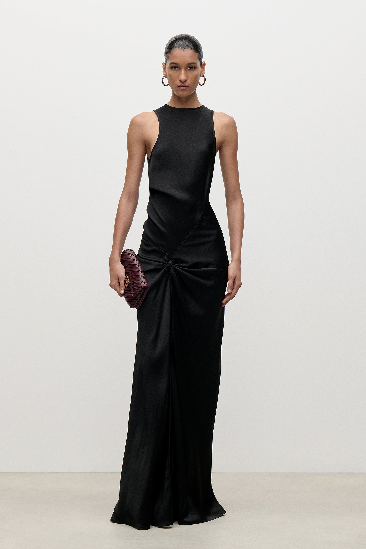 Sleeveless Twist Gown In Black