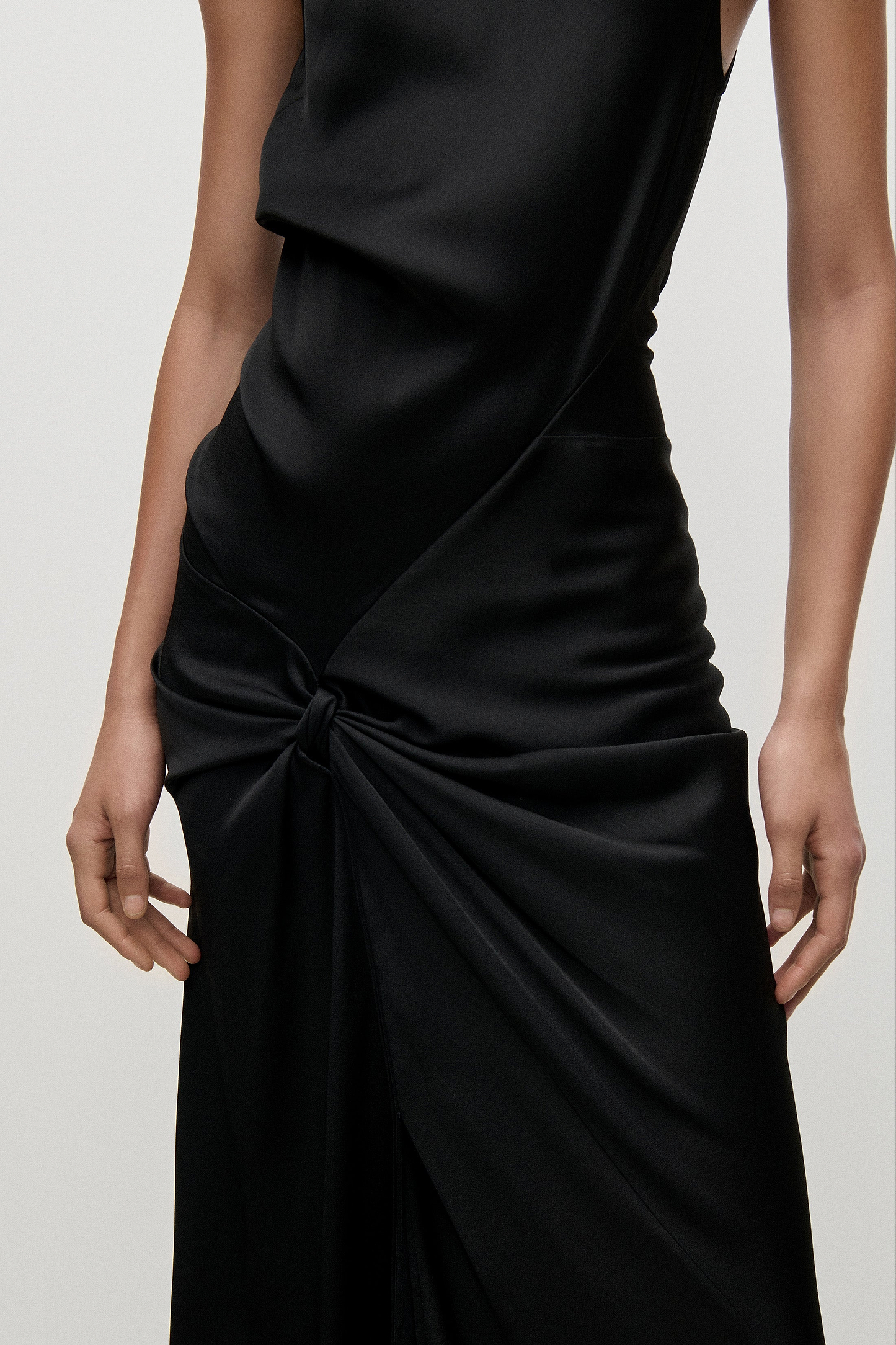 Sleeveless Twist Gown In Black