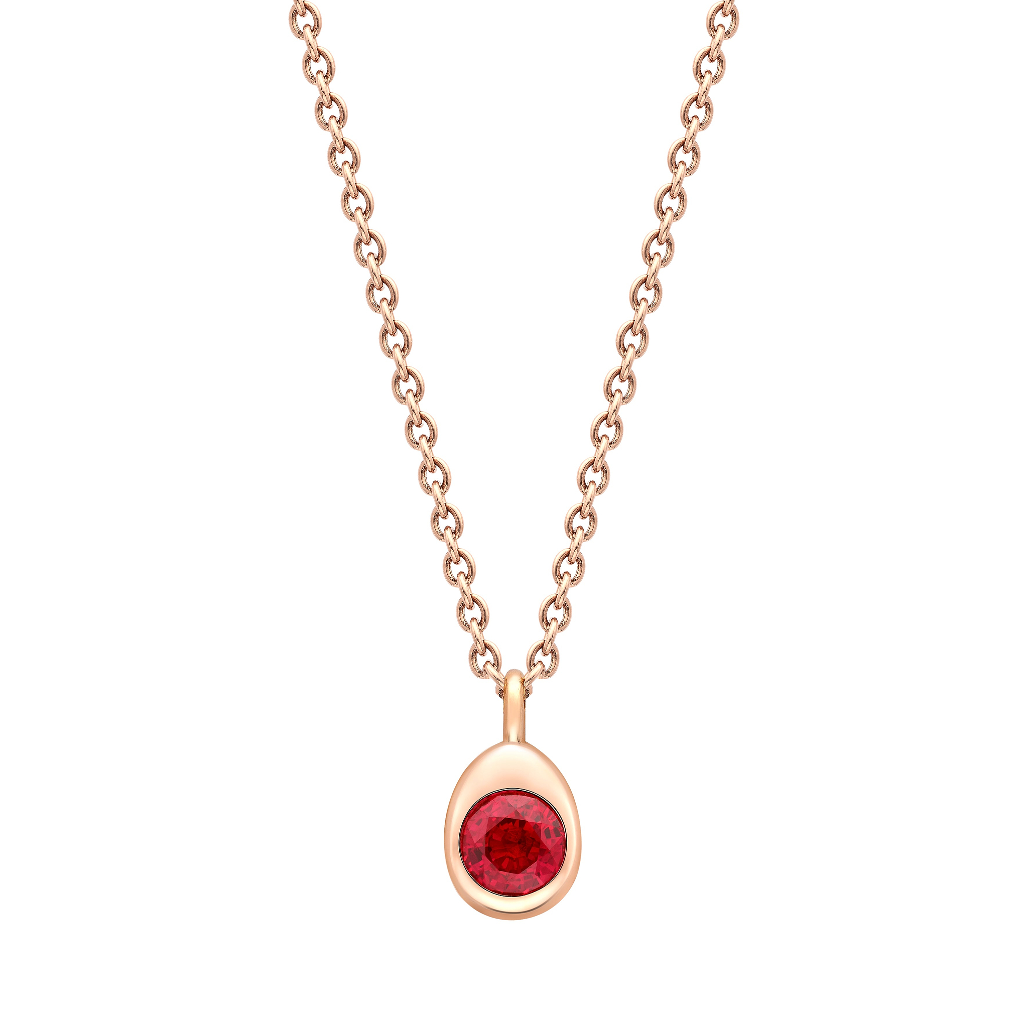 Fabergé gold and ruby necklace on a white background