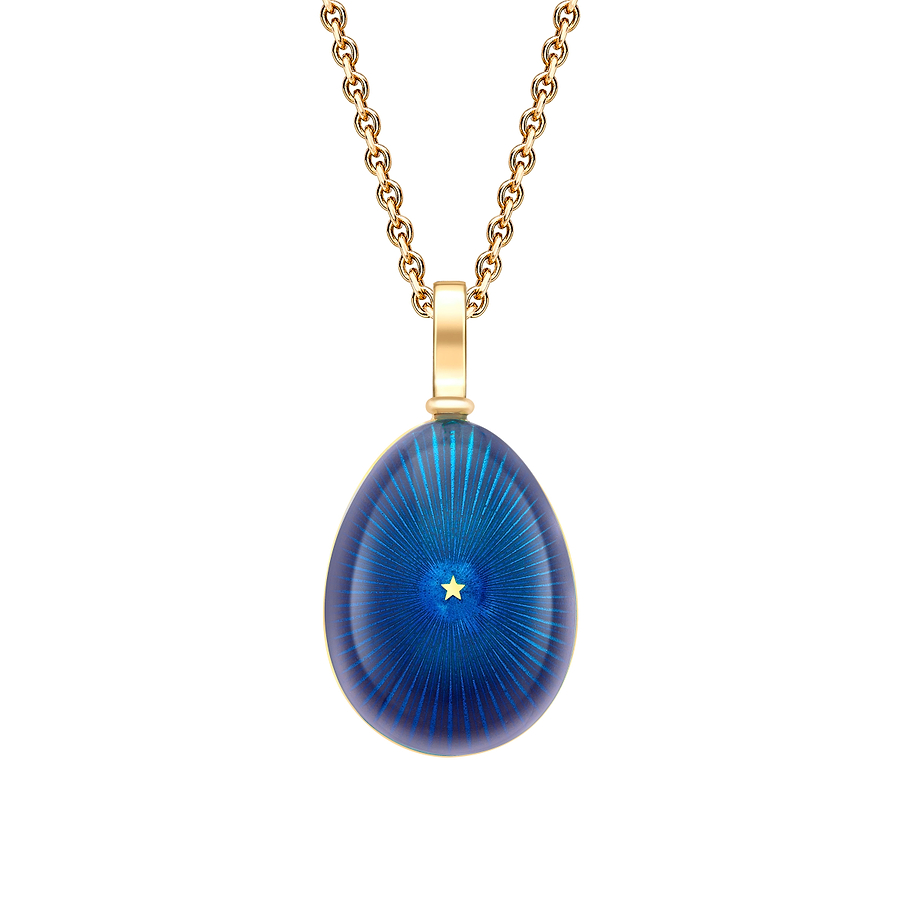 Fabergé pendant on a white background