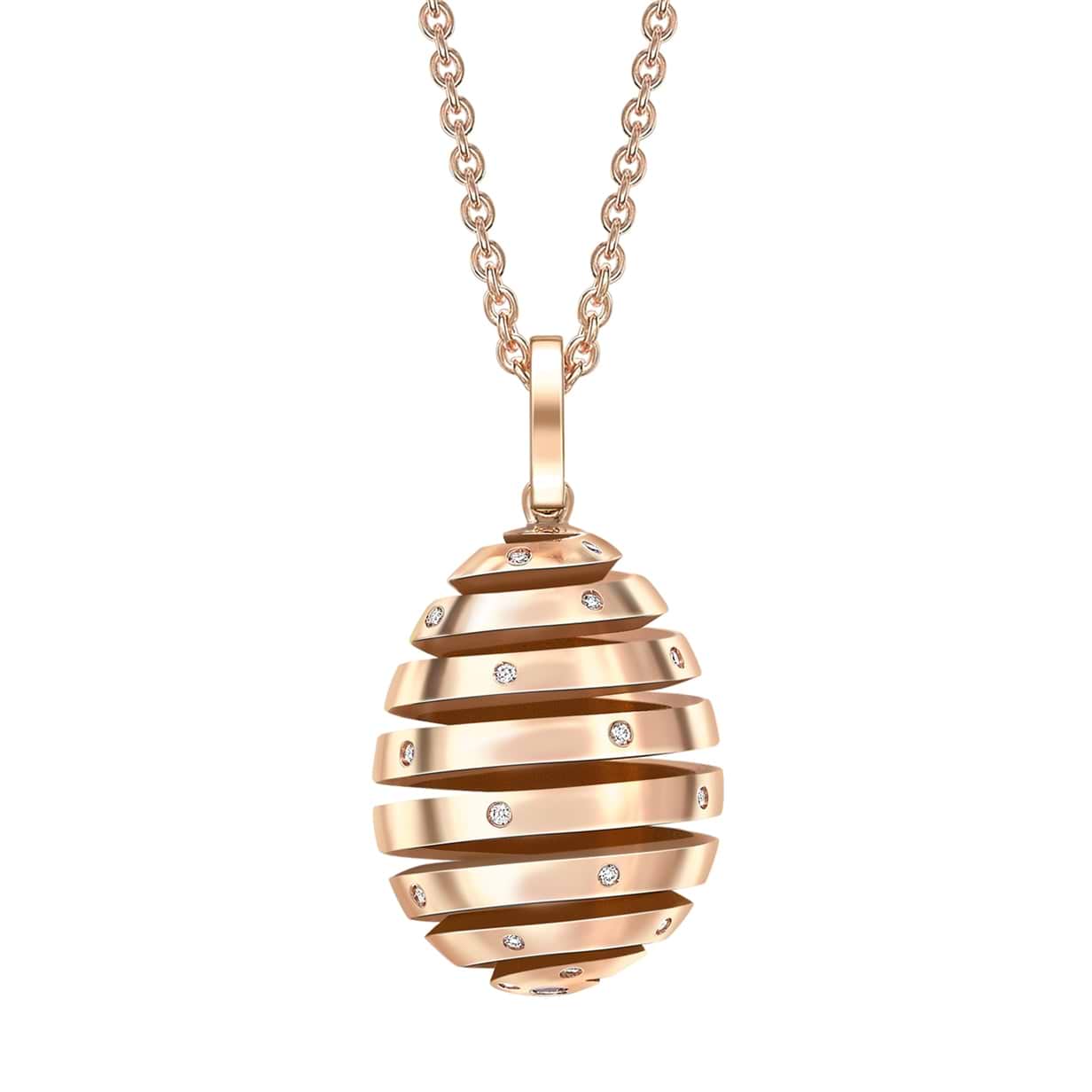 Fabergé rose gold pendant on a white background