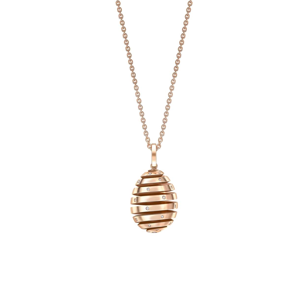 Fabergé gold pendant on a white background