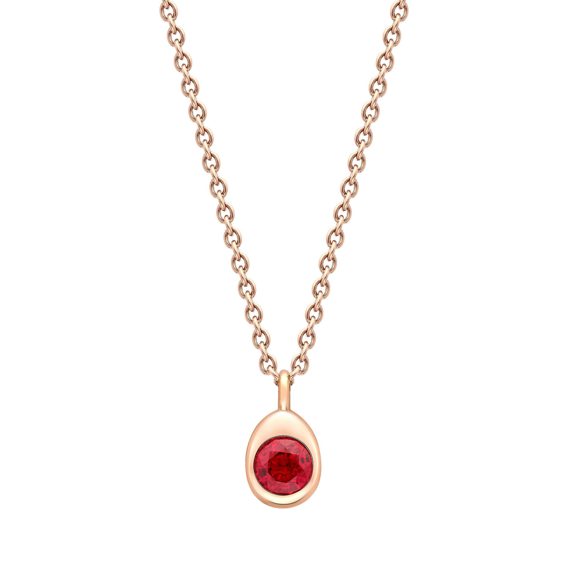 Fabergé gold and ruby necklace on a white background