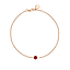 Fabergé gold and ruby bracelet on a white background