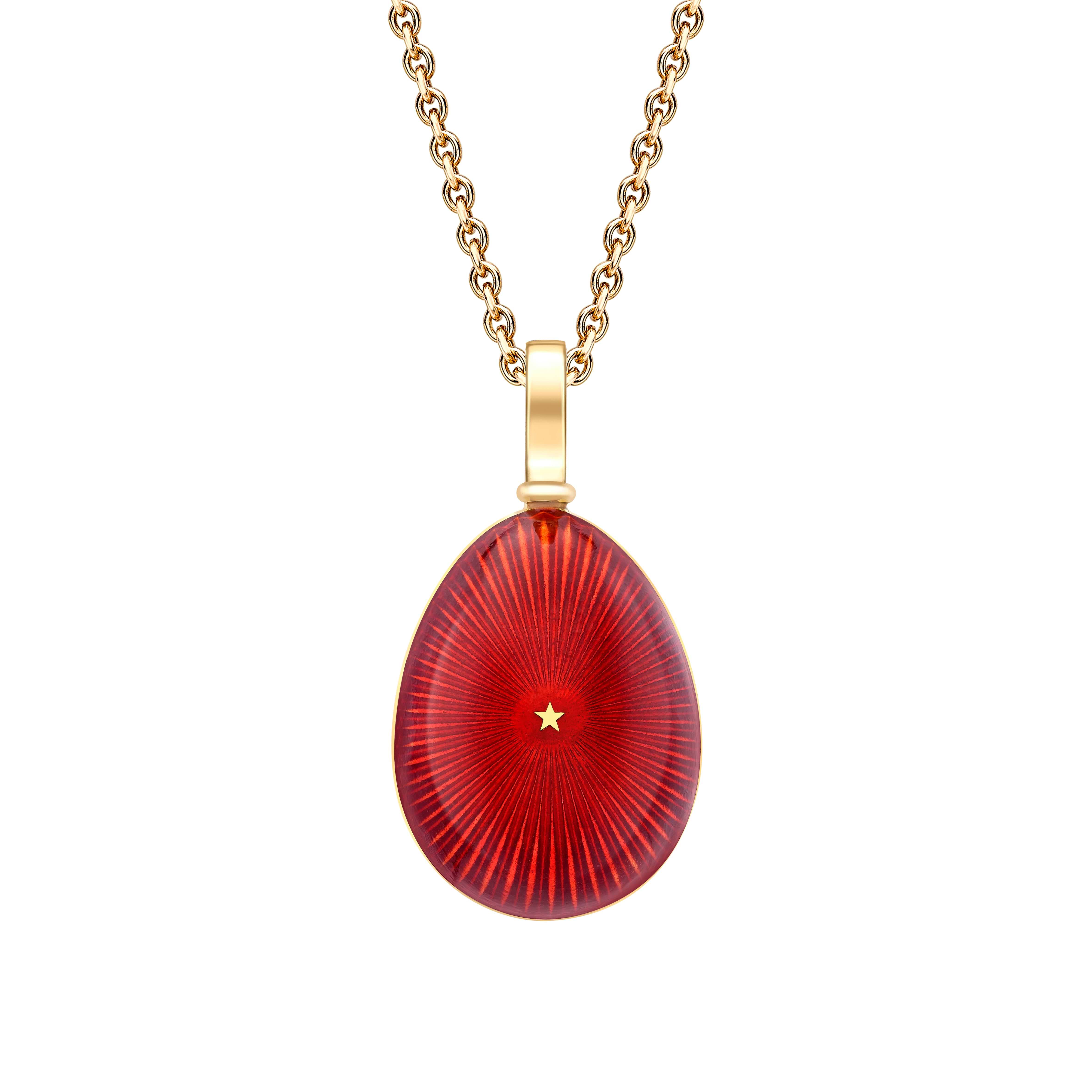 Fabergé pendant on a white background