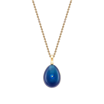 Fabergé pendant on a white background