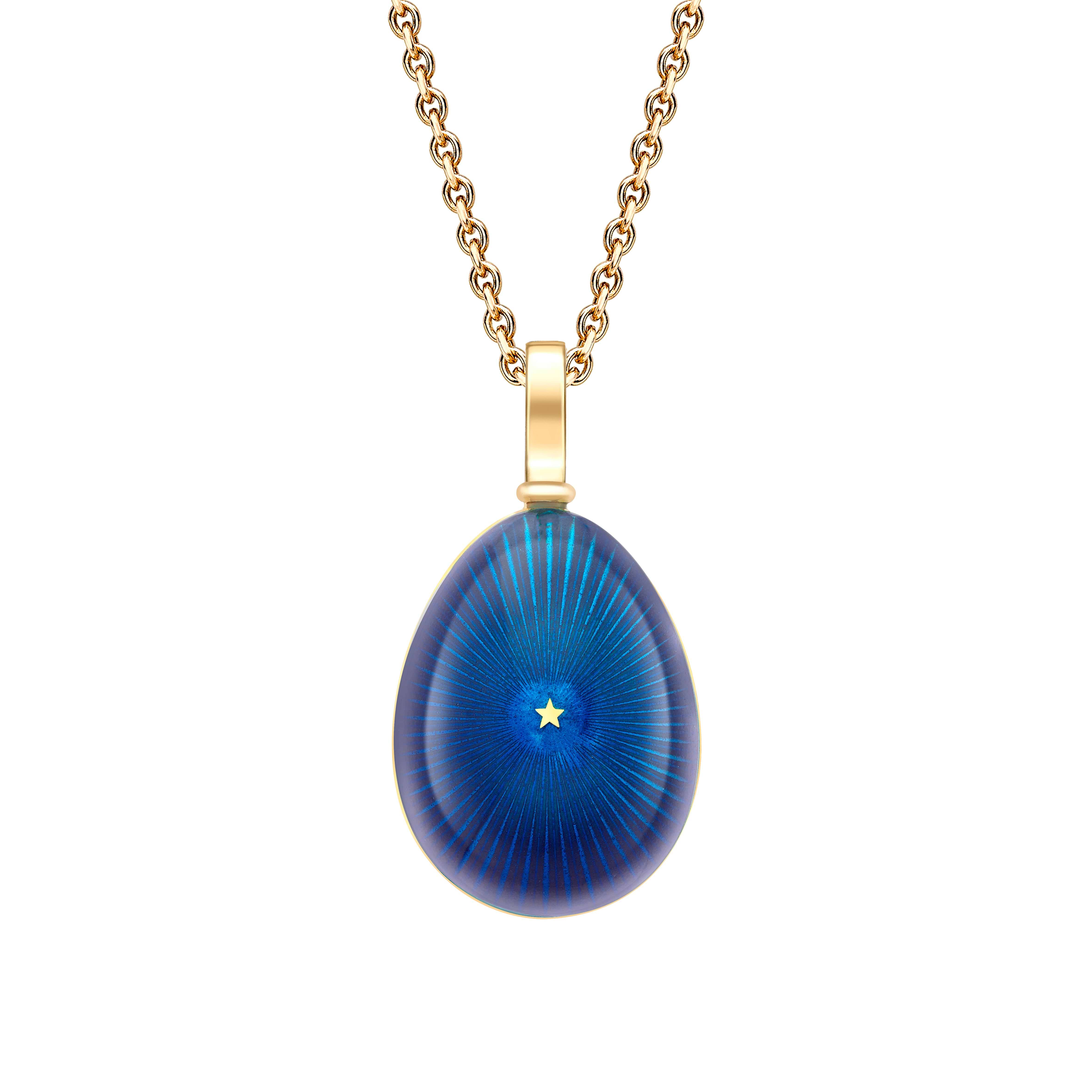 Fabergé pendant on a white background