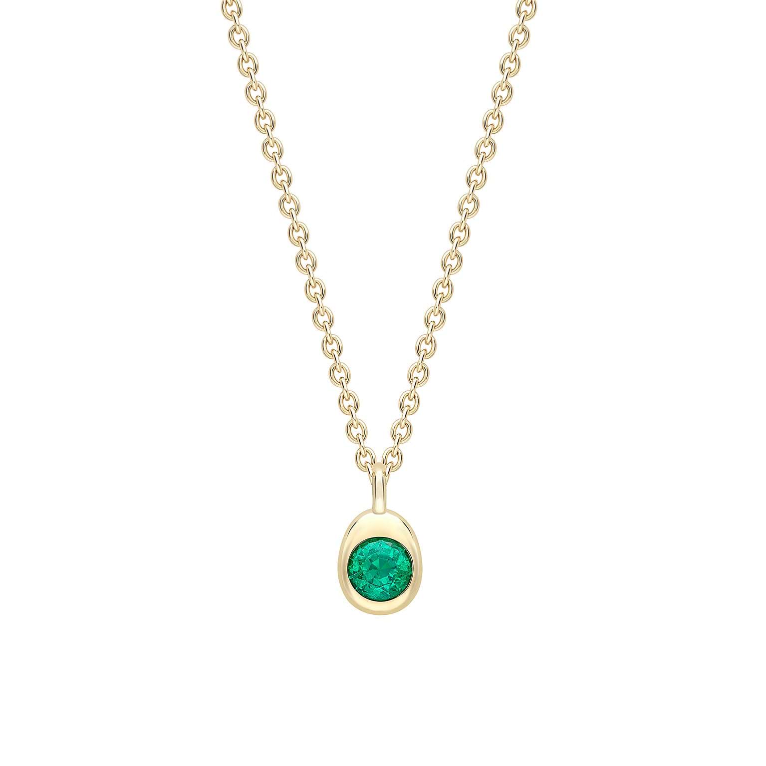 cosmic-curve-yellow-gold-emerald-pendant37413-0_FABERGÉ