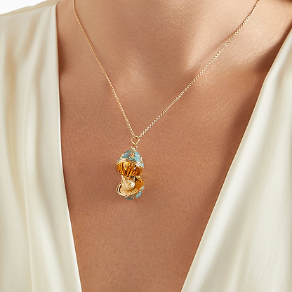 Yellow Gold Diamond & Turquoise Guilloché Enamel Hen Surprise Locket | Fabergé