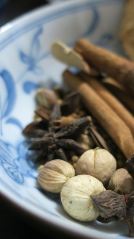 Traditional Chinese herbs in a porcelain bowl