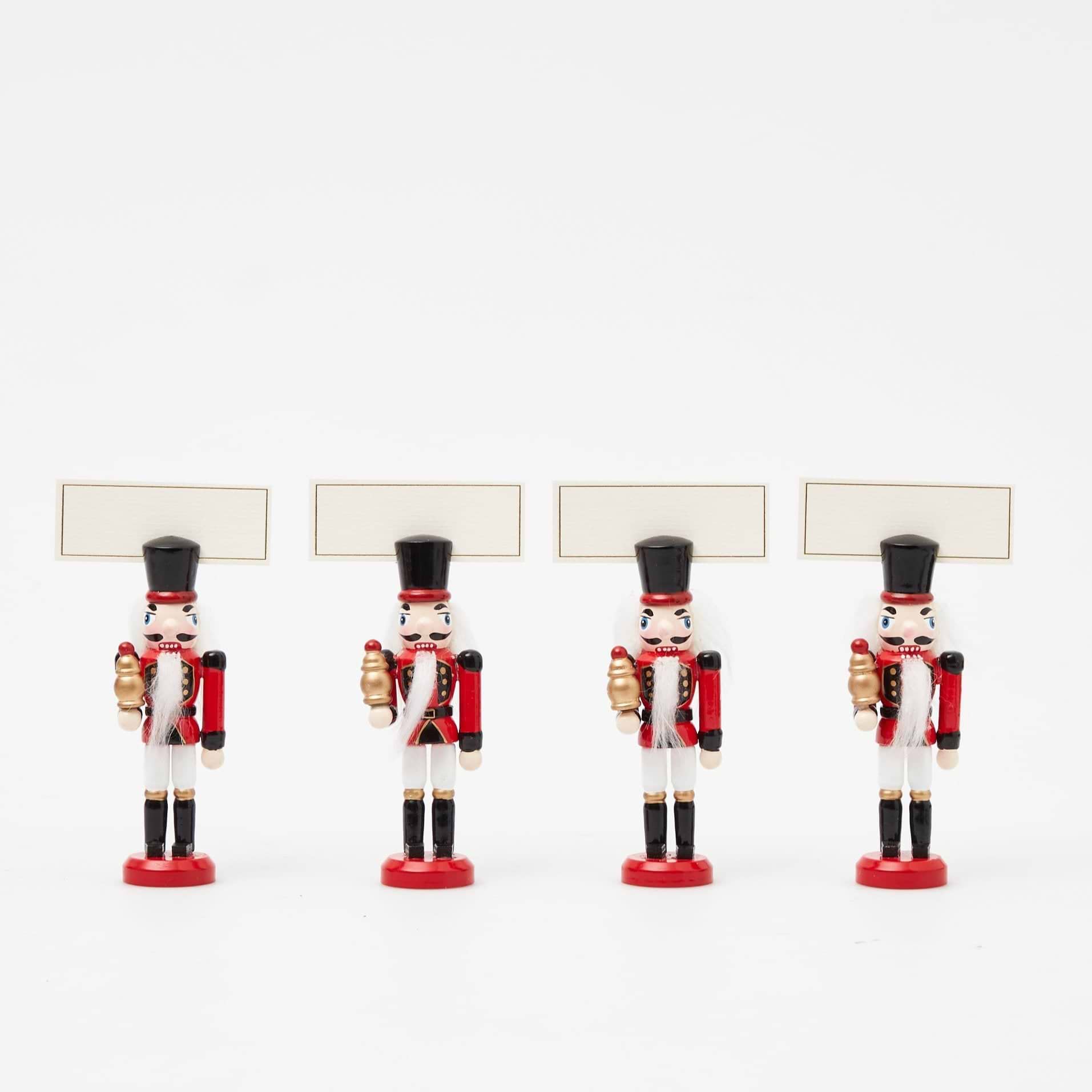 Set your holiday table with these charming Red Nutcracker Placecard Holders.