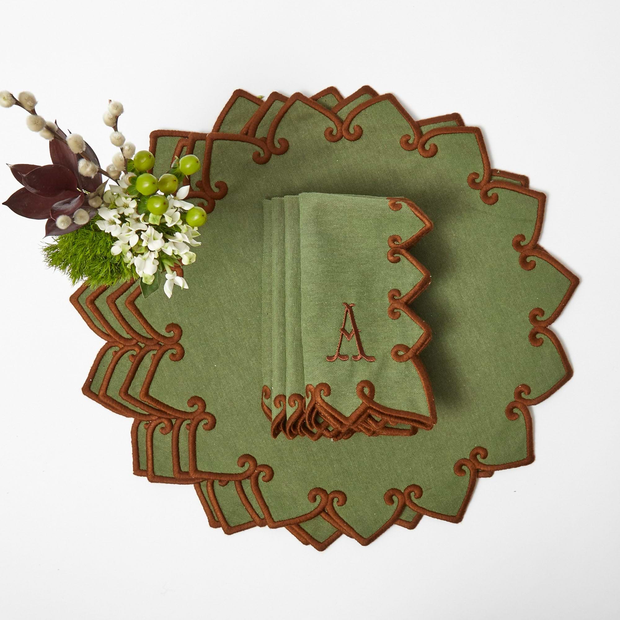Elevate your dining experience with the charming hues of this placemat and napkin set.