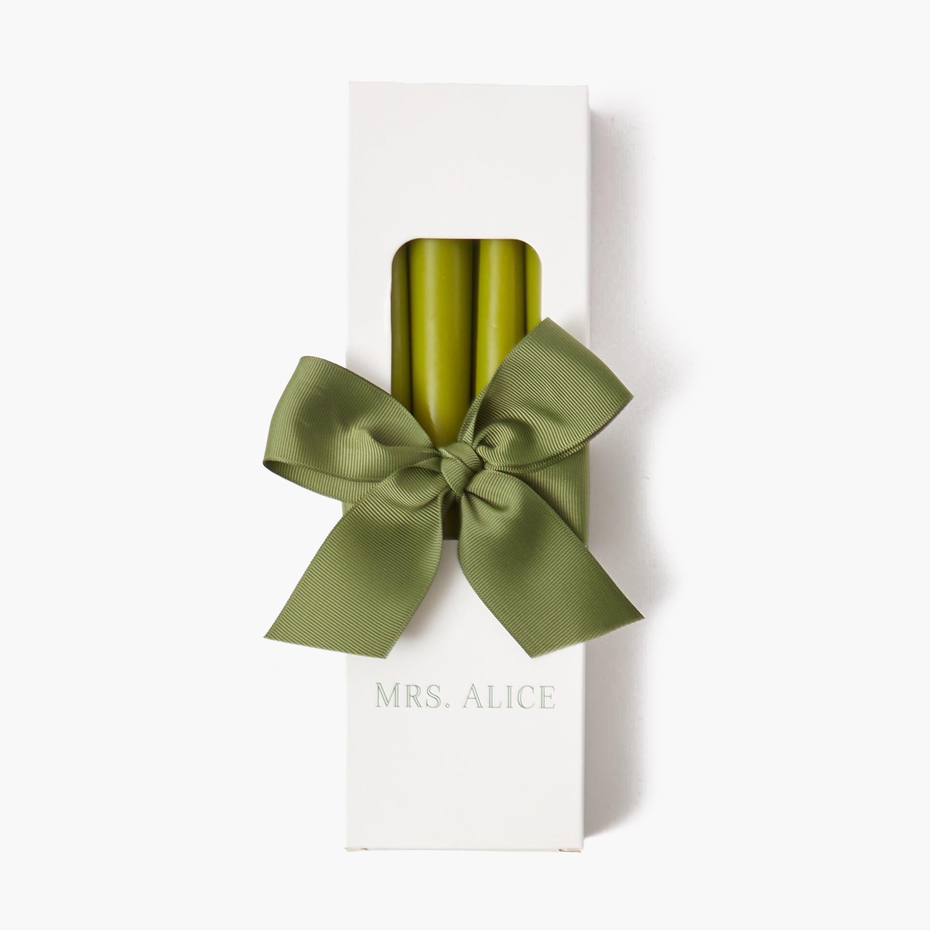 Illuminate your space with the lively glow of Apple Green Candles in this charming set of 8.