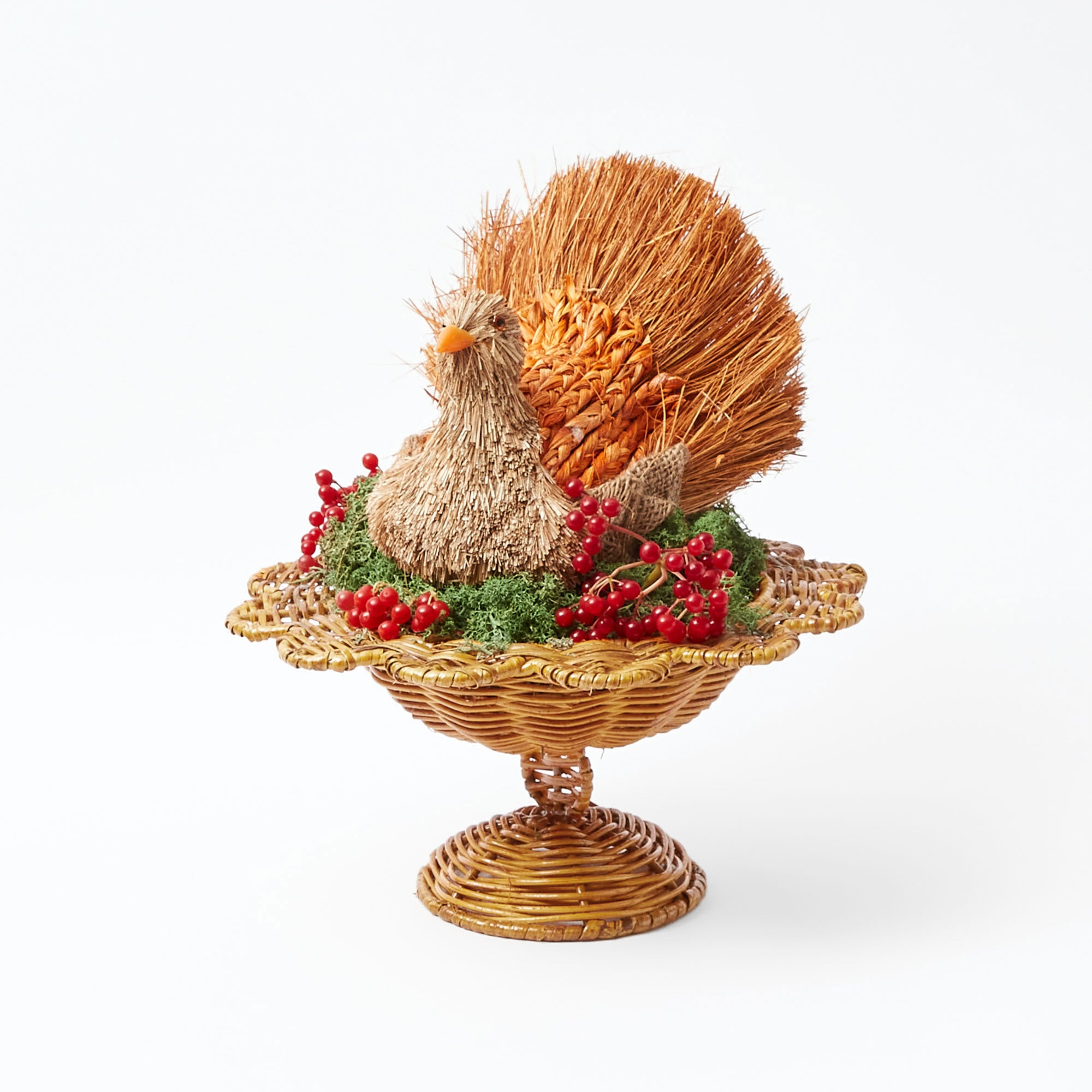 Petite rattan bowl exhibiting the distinctive Luciana scalloped design.