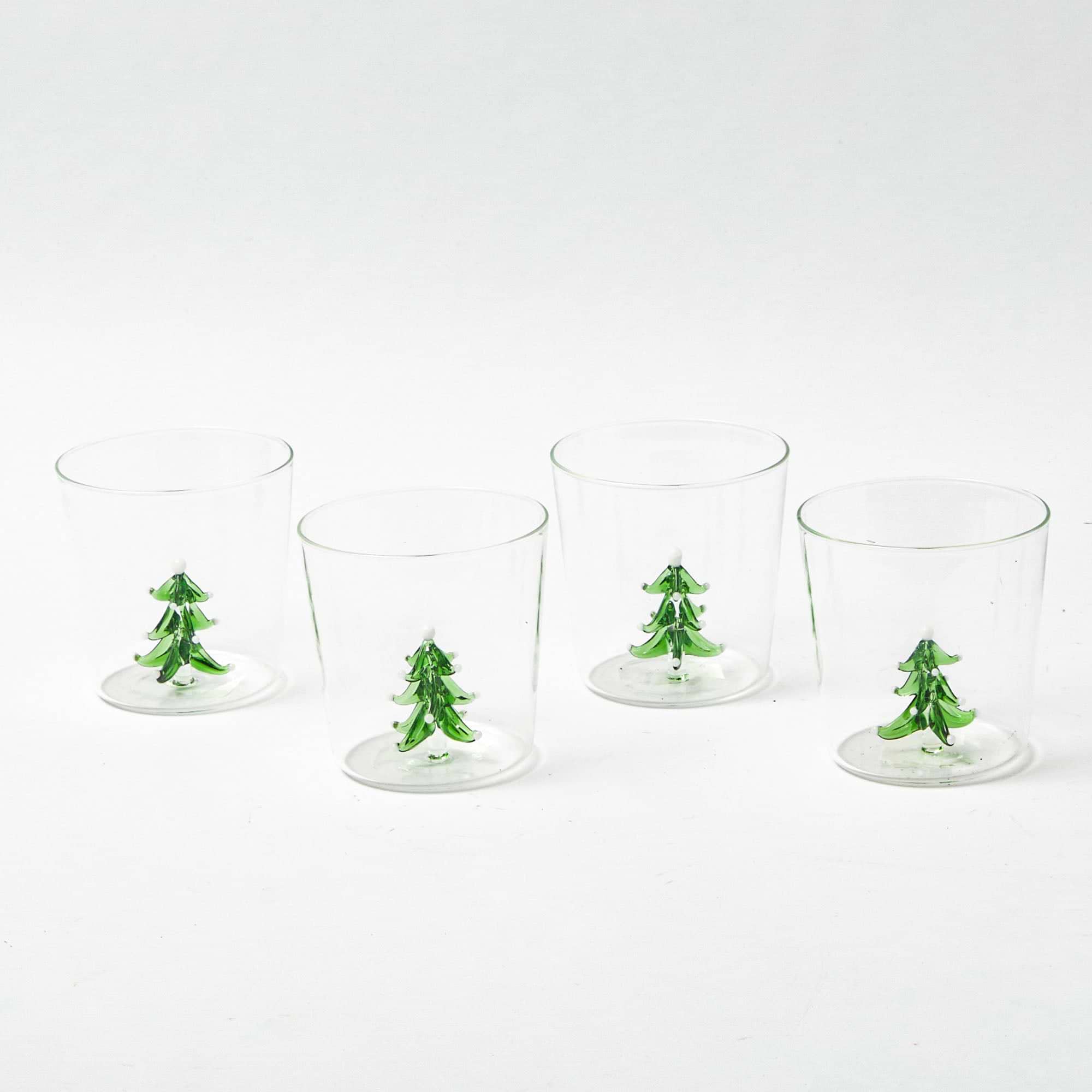 Add a touch of yuletide joy to your table settings with these Christmas Tree Glasses.