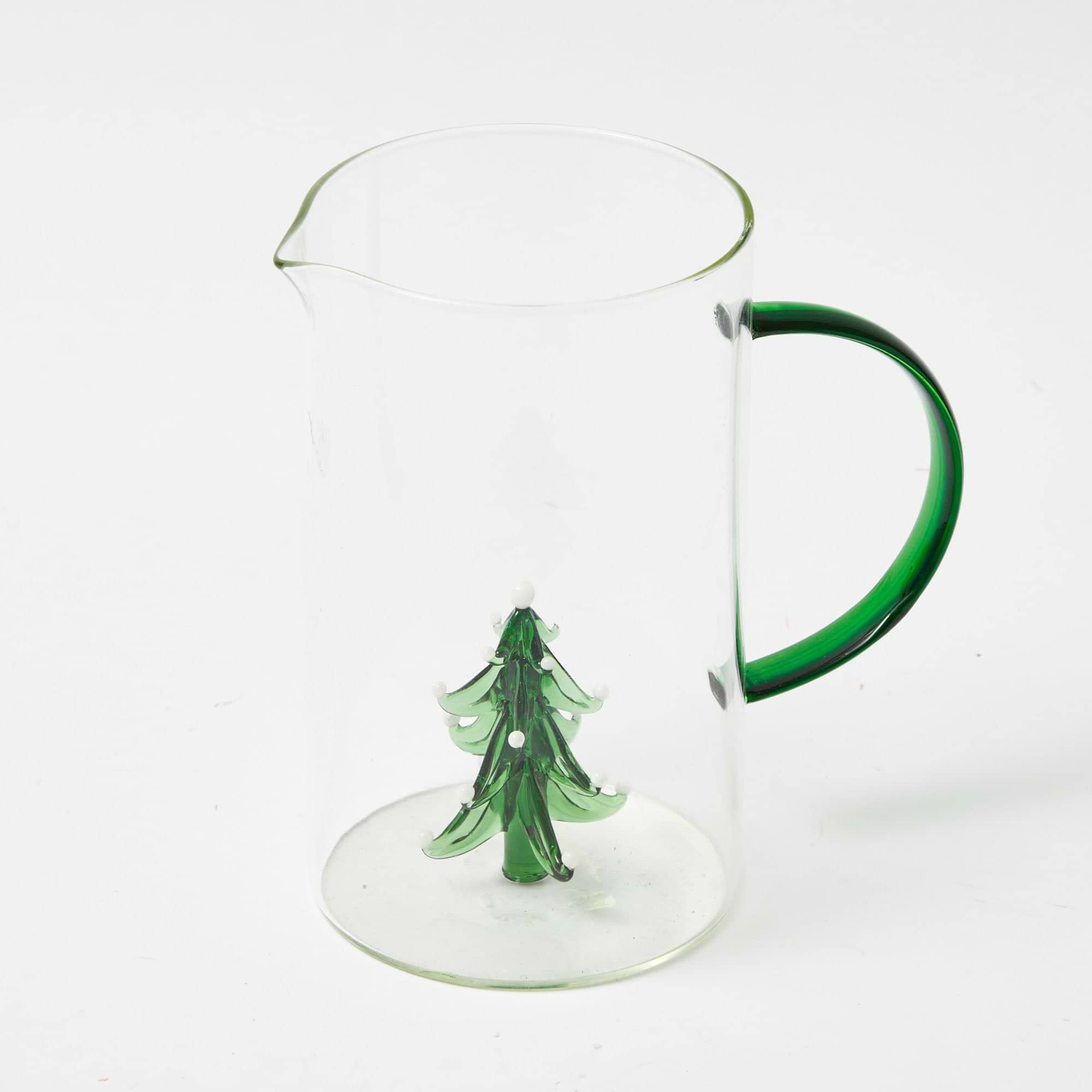 Serve your favorite beverages in these cheerful Christmas Tree Jug and Glasses.