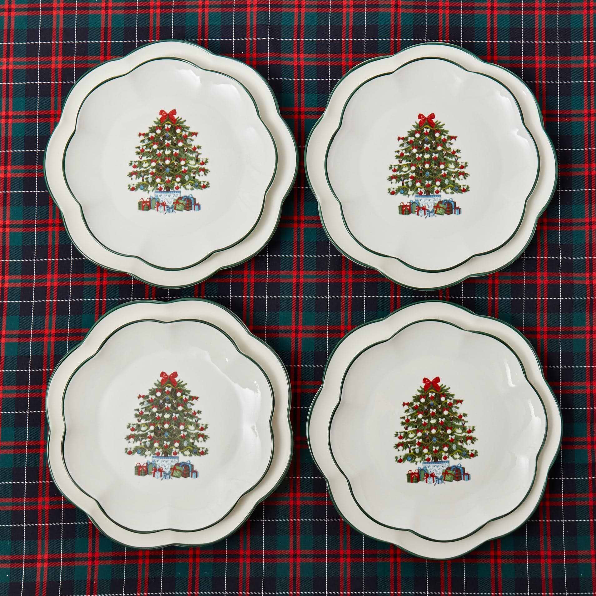 Add a touch of holiday cheer to your Christmas table setting with the Mrs. Alice Christmas Tree Starter Plate Set - a delightful quartet that infuses your dining experience with the joy and spirit of the season.