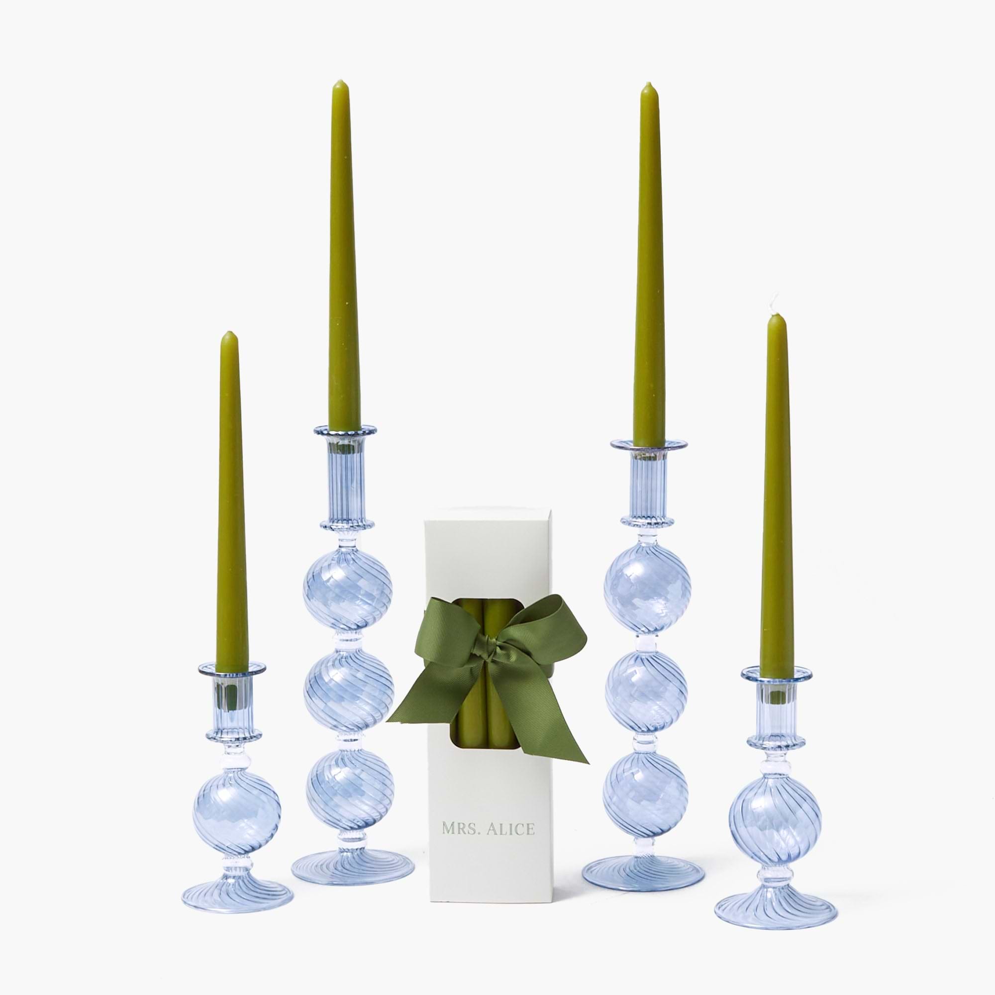Illuminate your space with the soothing glow of these Camille Azure Candles in refreshing Apple Green.