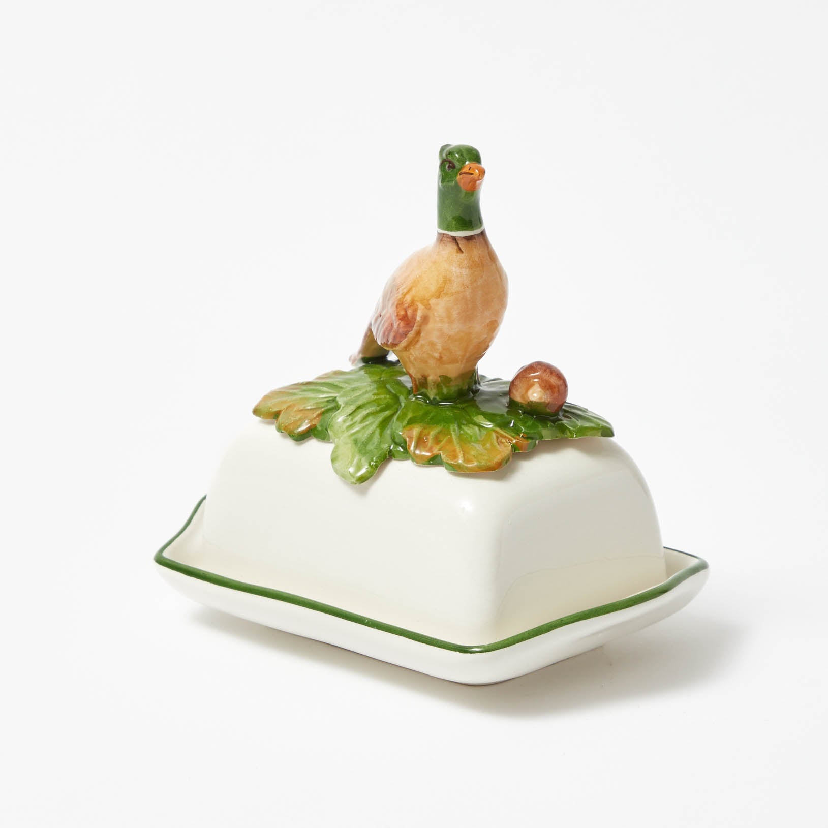 Artisanal detailing meets functionality in the Pheasant Butter Dish design.