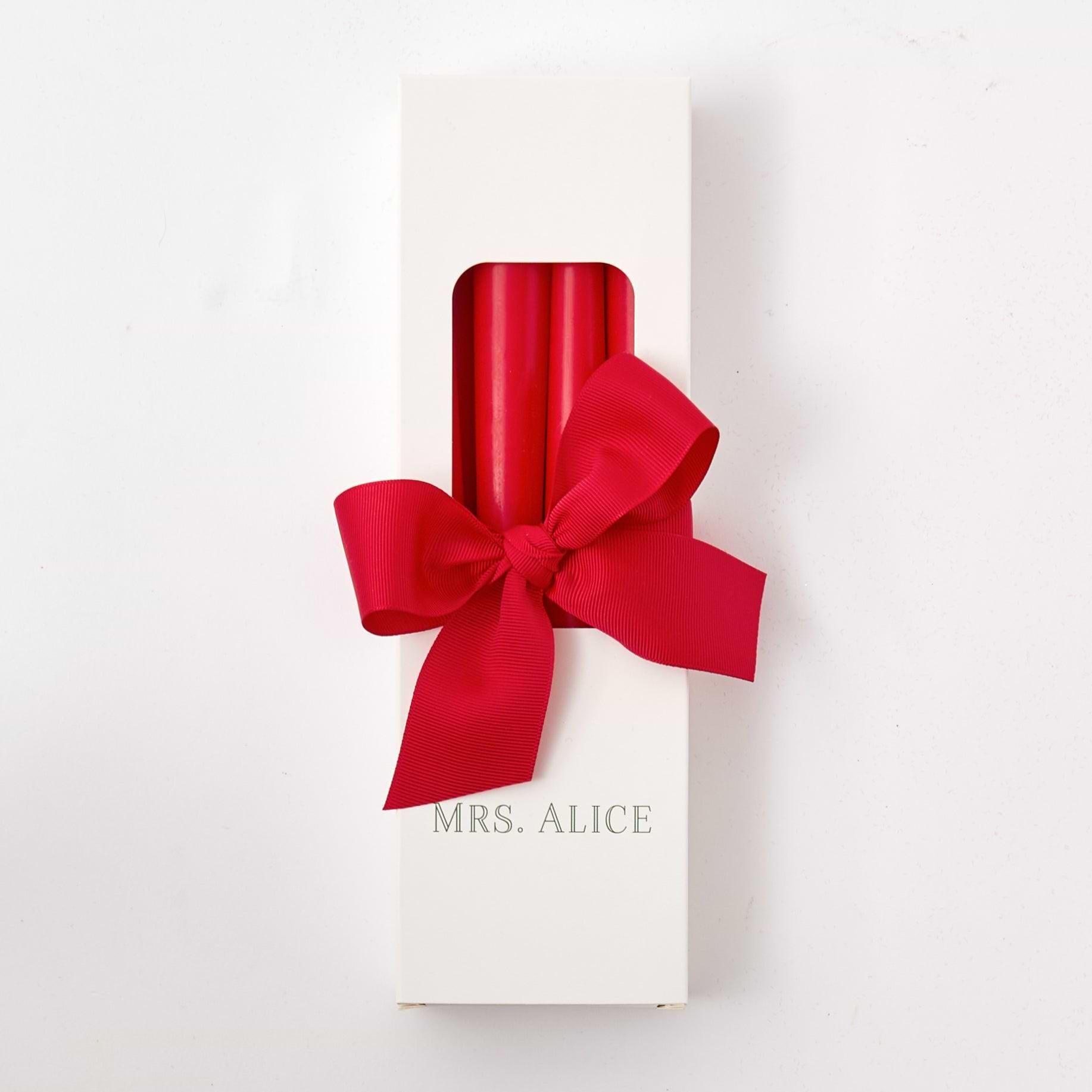 Elevate your ambiance with our Set of 8 Red Candles - a touch of fiery elegance for your decor.
