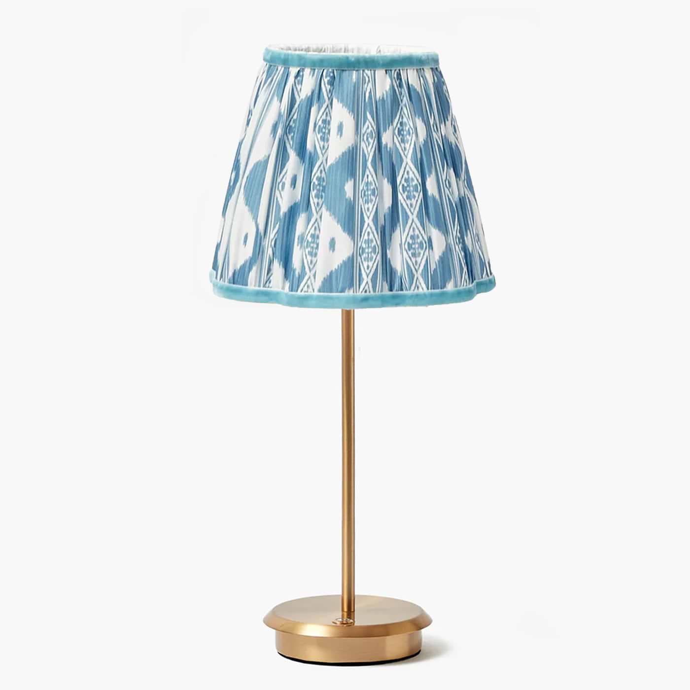 Illuminate your home in style with the Tall Rechargeable Lamp featuring a vibrant Blue Ikat Lampshade, a chic and cordless lighting solution that blends modern design with practicality.