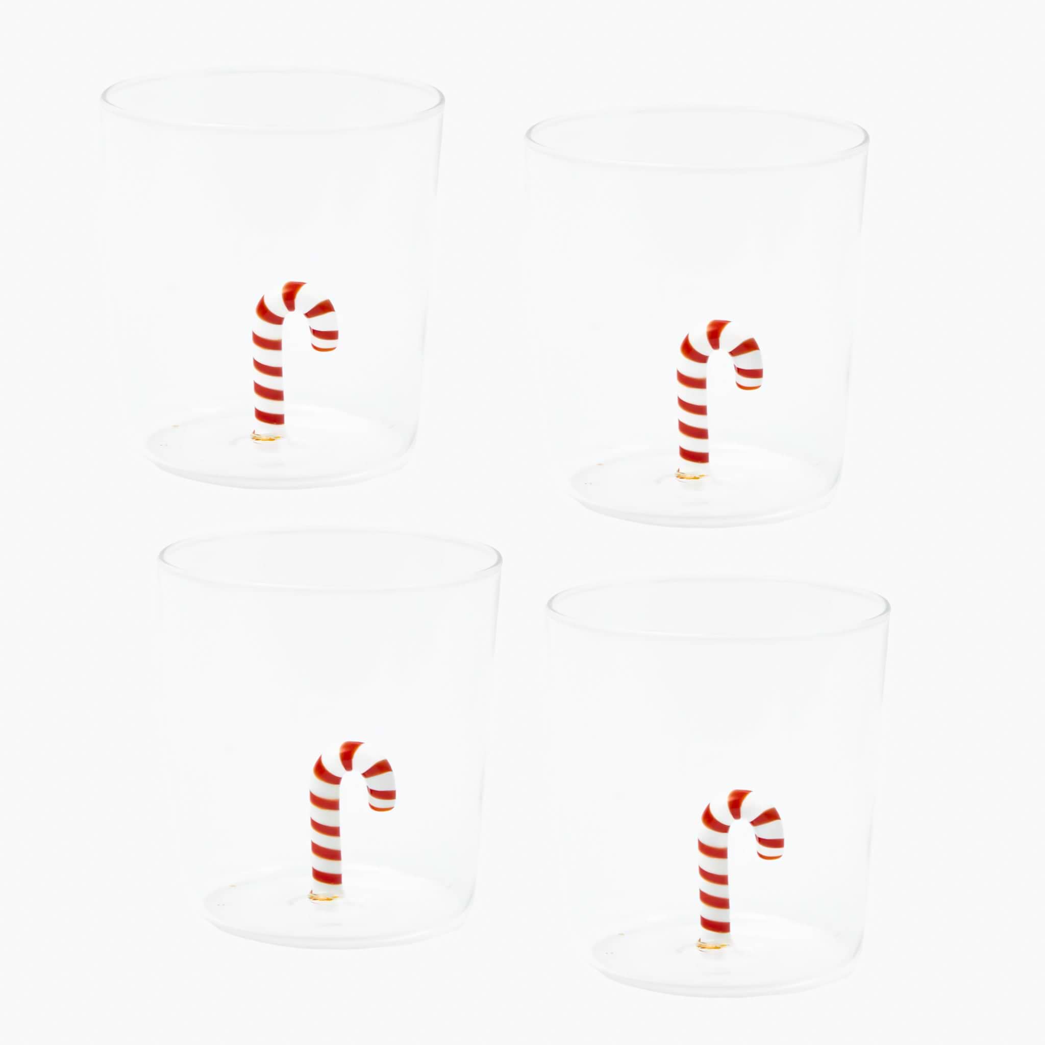 Four candy cane-shaped cups on a white background
