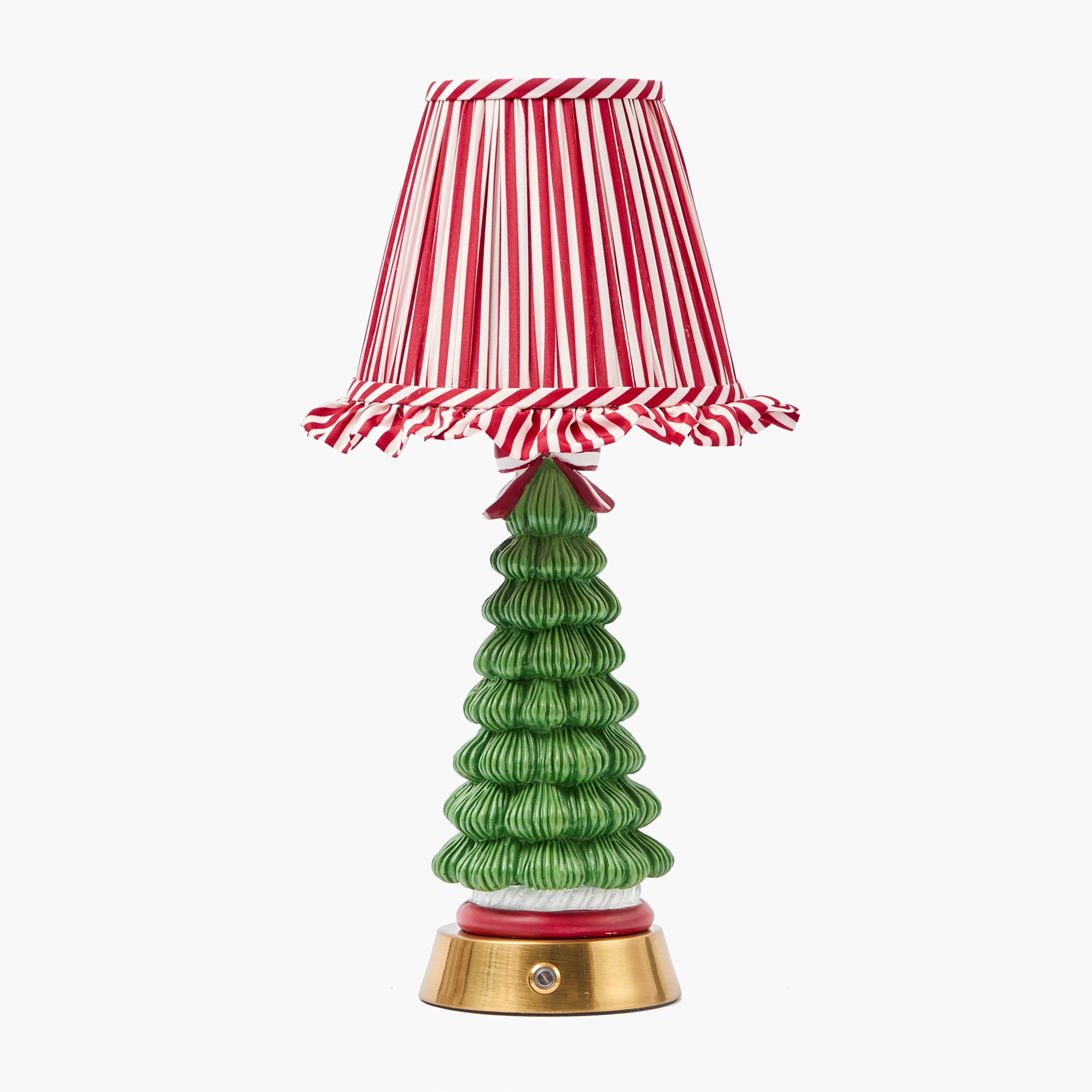 Decorative lamp with a green tree-shaped body and red and white striped shade on a white background