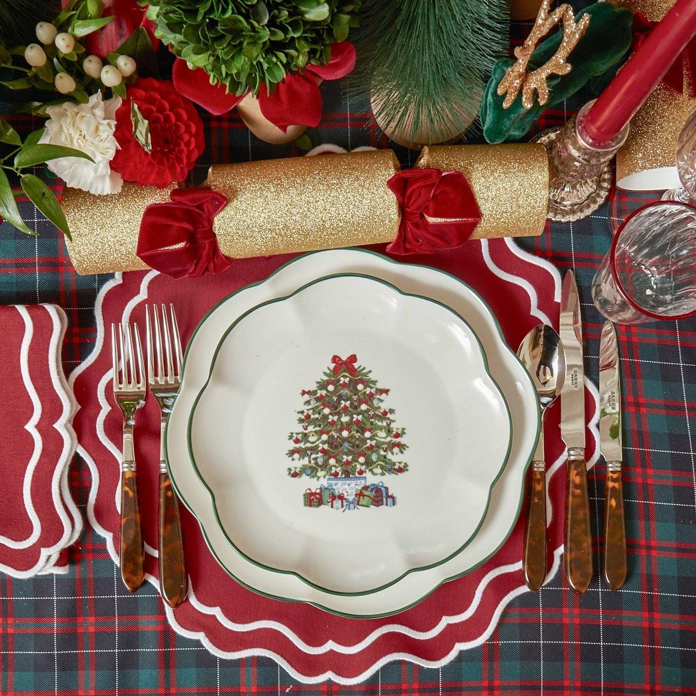 Add a touch of holiday elegance to your Christmas dinners with the Katherine Berry Red Napkins Set, perfect for creating a coordinated and inviting dining atmosphere, complete with monogramming options.