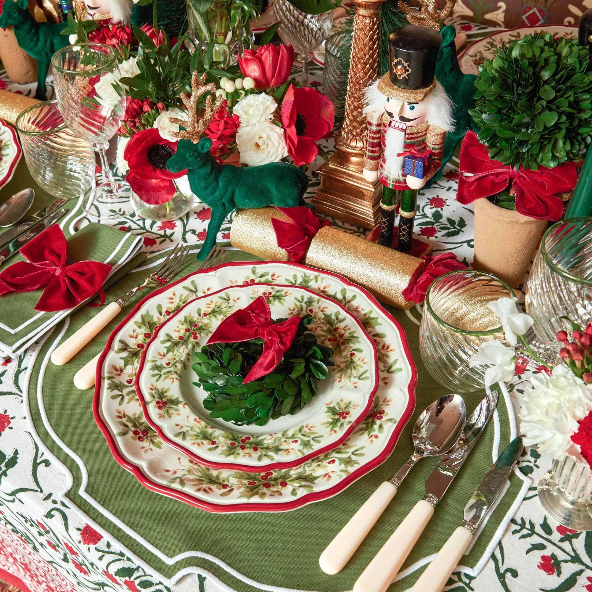 Turn your Christmas celebrations into a whimsical affair with the Red Ribboned Potted Boxwood Balls, a must-have for adding a touch of Christmas magic to your decorations and infusing your holiday decor with a warm and festive touch.
