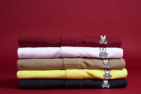 polos stacked with a psycho bunny logo