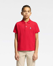 Red kids classic pique polo shirt with a classic fit, featuring a two-button placket, ribbed collar and cuffs, and a small embroidered white Psycho Bunny skull logo on the left chest.