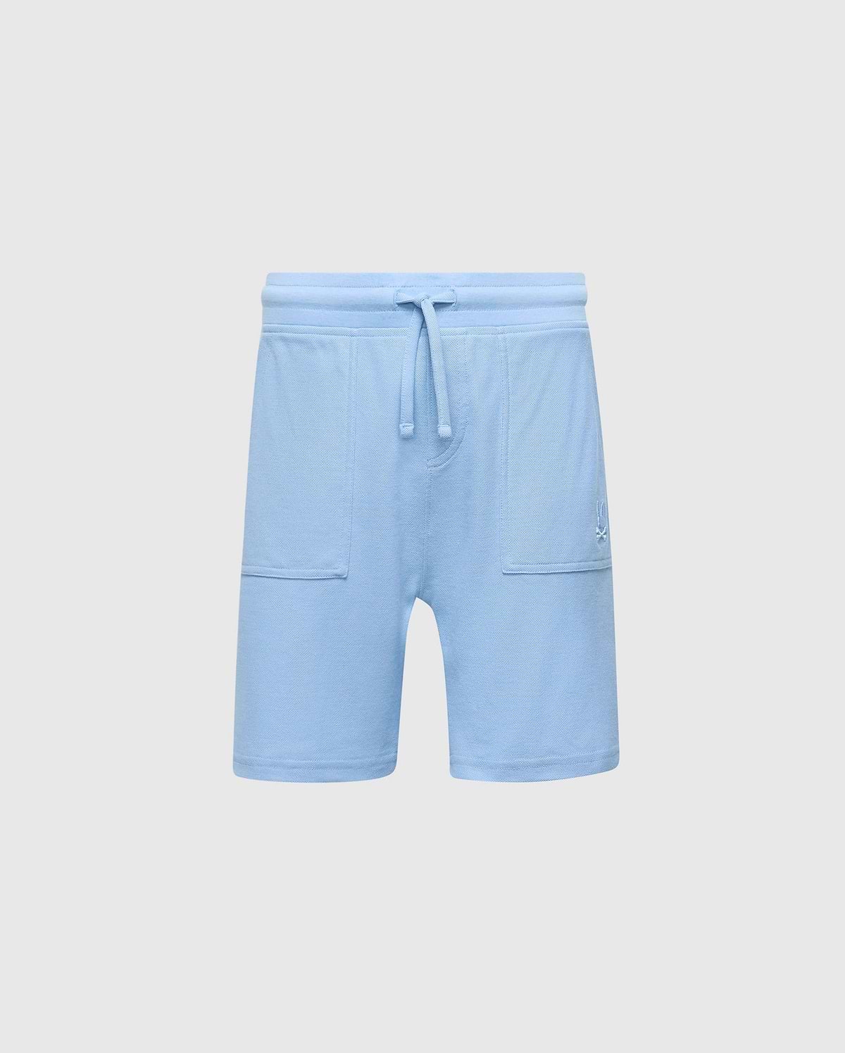 The KIDS TAYLOR LIGHT PIQUE SWEATSHORT by Psycho Bunny, in light blue Pima cotton, features a drawstring waistband, two front pockets, and an embroidered Bunny logo on the right. Ideal for a casual-chic look against a plain background.